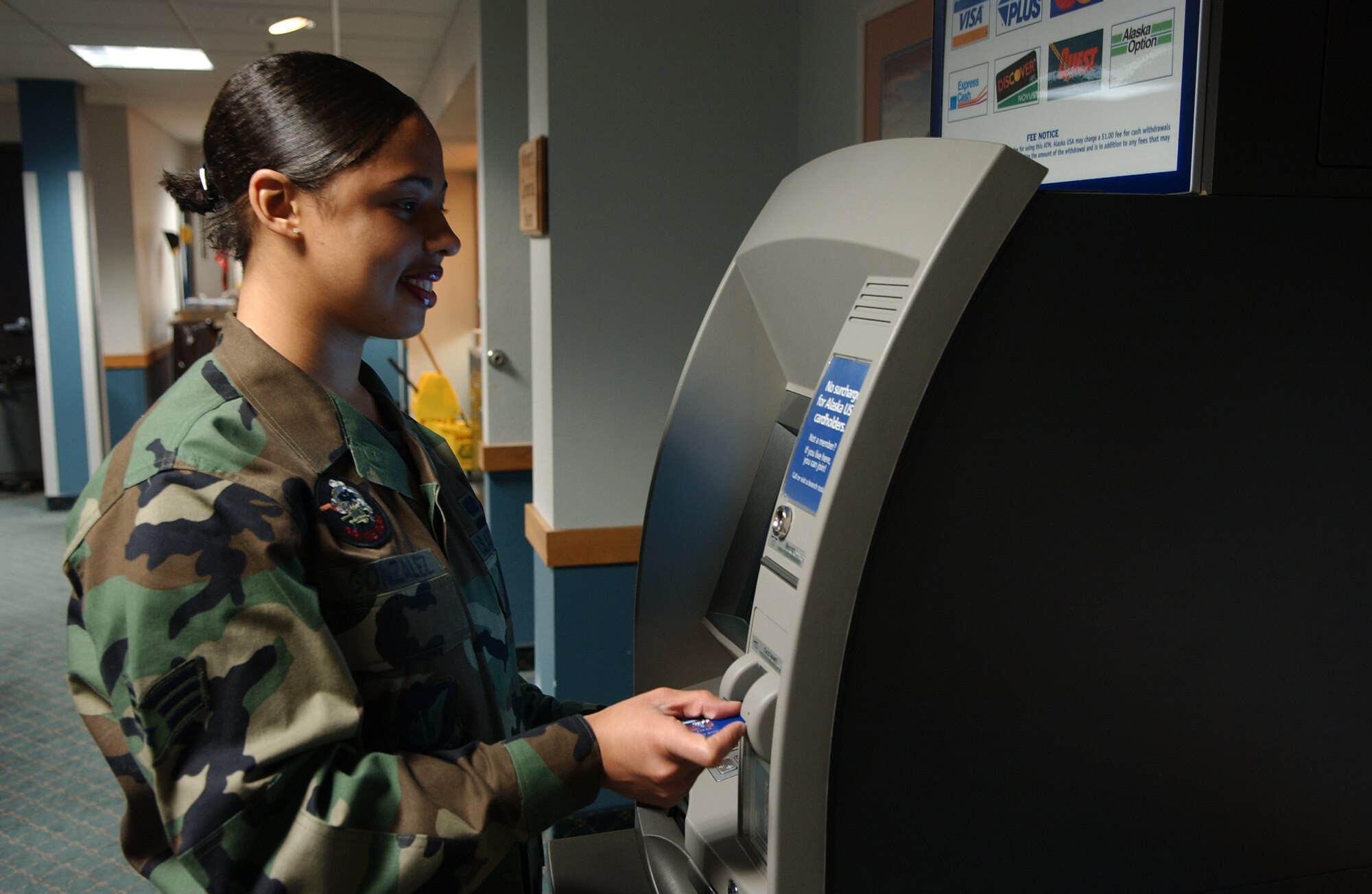 EIELSON AIR FORCE BASE, ALASKA-- Senior Airman (SrA) Johanna Gonzales uses an ATM located in the Gold Rush Inn. The ATM was moved from the BX hallway into the inn so that Airman and their families would have 24-Hour access to the ATM. Senior Airman Gonzales is assigned to the 354th Services Squadron, 354th Mission Support Group, 354th Fighter Wing.
(US Air Force photo by Senior Airman Anthony Nelson Jr)