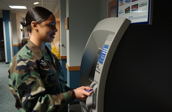 EIELSON AIR FORCE BASE, ALASKA-- Senior Airman (SrA) Johanna Gonzales uses an ATM located in the Gold Rush Inn. The ATM was moved from the BX hallway into the inn so that Airman and their families would have 24-Hour access to the ATM. Senior Airman Gonzales is assigned to the 354th Services Squadron, 354th Mission Support Group, 354th Fighter Wing.
(US Air Force photo by Senior Airman Anthony Nelson Jr)