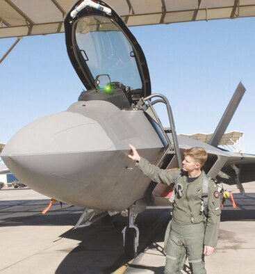 Lt. Cmdr. Michael Wosje, 59th Test and Evaluation Squadron F-22 pilot, conducts a pre-flight inspection on Nellis’ newest edition to the Raptor family. “I got to fly this one in as soon as it was completed from the assembly line from Marietta, Ga.,” said Commander Wosje. He is the only Navy pilot flying the Raptor for the Air Force.(U.S. Air Force Photo/Airman 1st Class Brian Ybarbo)