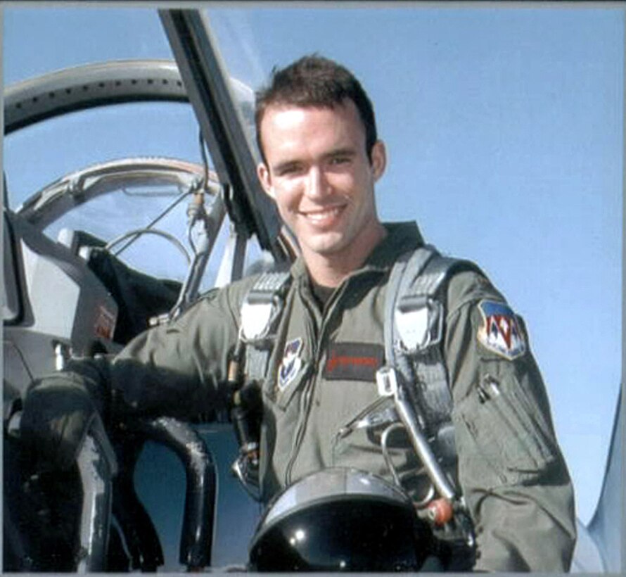 2nd Lt. Chris Bachelor in his Pilot Training graduation photo. 2nd Lt. Bachelor will be assigned to the Air Force Reserve Command's 301st Fighter Wing upon his F-16 fighter pilot training. (U.S. Air Force Photo)