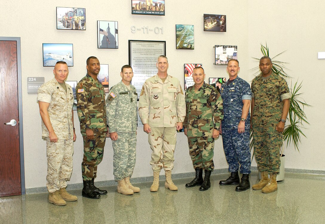 Senior enlisted leaders of United States unified combatant commands recently attended the first Combatant Command Senior Enlisted Leader Conference at Peterson Air Force Base, Colo. From the left are Marine Sgt. Maj. William Kinney, U.S. Pacific Command; Army Command Sgt. Maj. Michael Bartelle, U.S. European Command; Army Command Sgt. Maj. Mark Ripka, U.S. Joint Forces Command; Air Force Chief Master Sgt. Curtis Brownhill, U.S. Central Command; Army Command Sgt. Maj. Michael Balch, U.S. Southern Command; Navy Master Chief Petty Officer William Nissen, U.S. Strategic Command; and conference host Marine Sgt. Maj. D. Scott Frye, North American Aerospace Defense Command and U.S. Northern Command. Photo by Sgt. 1st Class Gail Braymen, USA