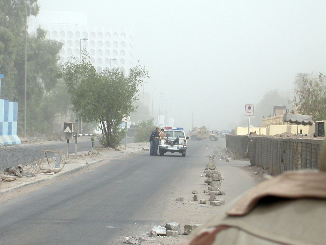 An Iraqi explosive ordnance detonation team disarms a suicide bomber vest outside an International Zone checkpoint today. The suicide bomber was shot and captured after attempting to run away from the scene.  Photo courtesy U.S. Army