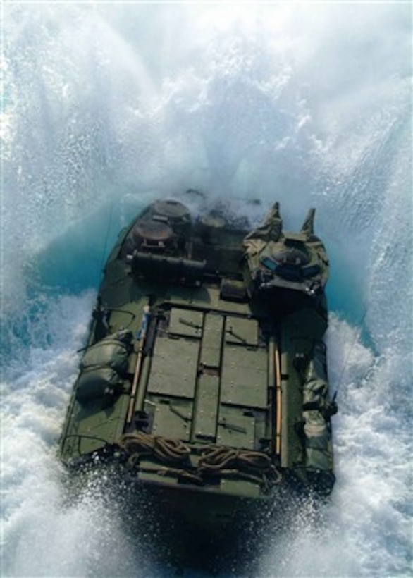 An amphibious assault vehicle launches from the well deck of the USS Harpers Ferry (LSD 49) on Jan. 29, 2007, during amphibious specialty training off the coast of Okinawa, Japan.  