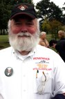 John Clodfelter wears a shirt commemorating the USS Cole and his son, Petty Officer 2nd Class Kenneth E. Clodfelter, who was killed in the Oct. 12, 2000, terrorist attack on the guided missile destroyer. Photo by Rudi Williams