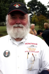 John Clodfelter wears a shirt commemorating the USS Cole and his son, Petty Officer 2nd Class Kenneth E. Clodfelter, who was killed in the Oct. 12, 2000, terrorist attack on the guided missile destroyer. Photo by Rudi Williams