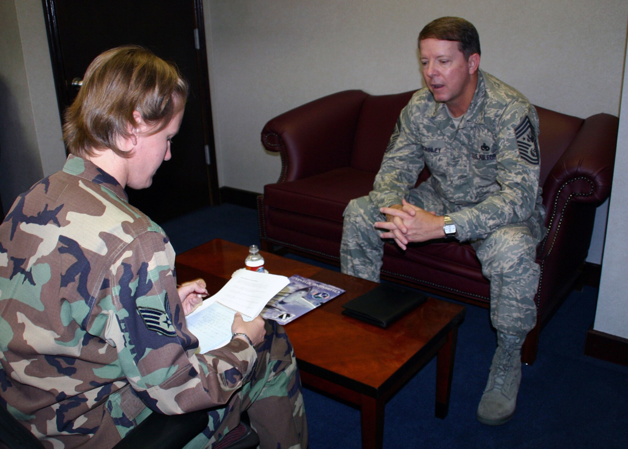 TINKER AIR FORCE BASE, Okla -- Chief Master Sgt. of the Air Force Rodney McKinley, speaks about the importance of the E-3 Sentry during an interview with Staff Sgt. Stacy Fowler, 552nd Air Control Wing Public Affairs.  "There have been many times when other countries, knowing AWACS was there, wouldn't launch their aircraft. [They would say] 'No thanks, I'm going to stay on the ground,'" Chief McKinley said. (U.S. Air Force photo)