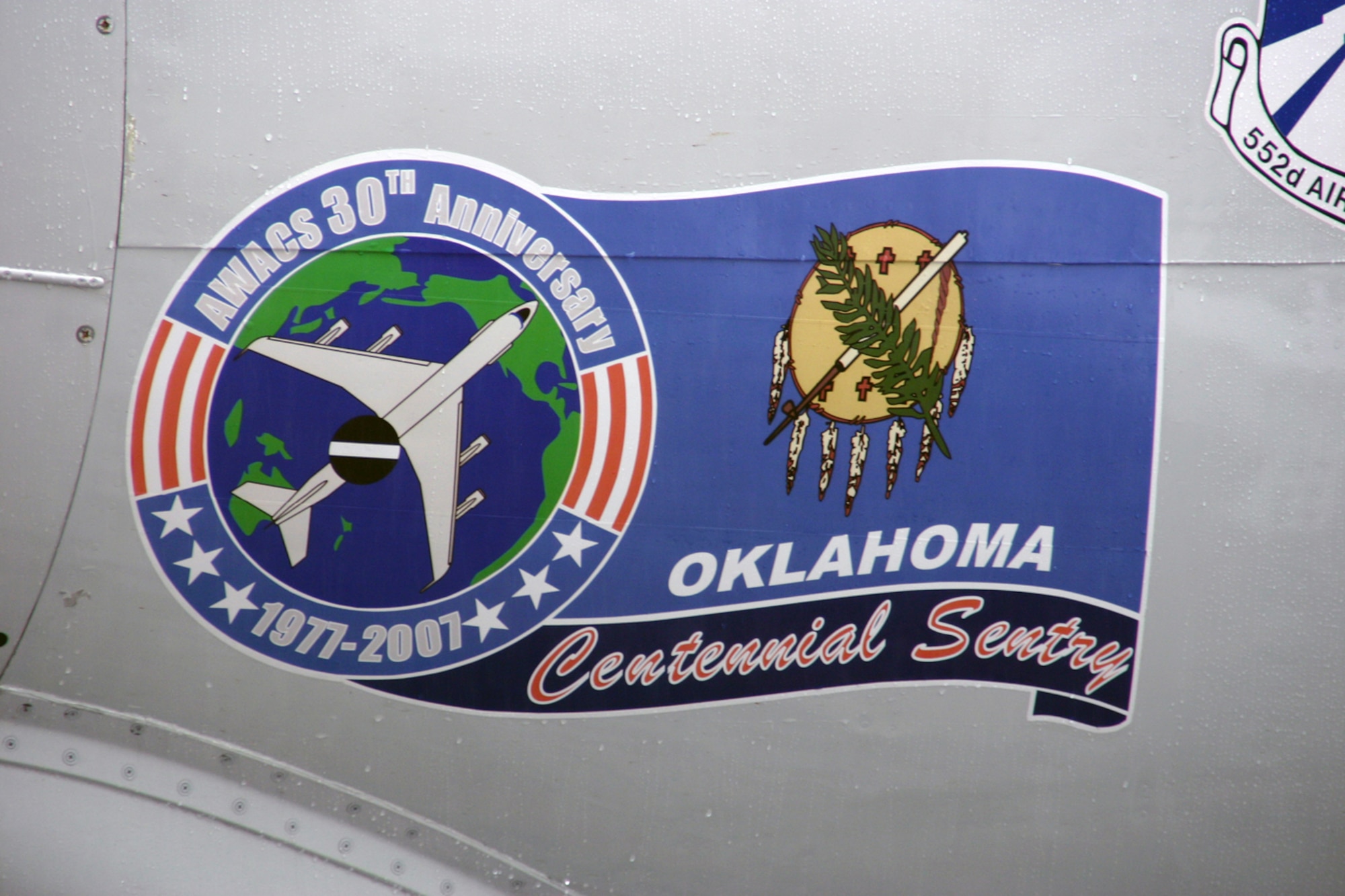 TINKER AIR FORCE BASE, Okla -- 1st Lts. Chris Chester and Gerrit Dalman, 964th Airborne Air Control Squadron, designed the E-3 Sentry 30th anniversary noseart, which was unveiled during the opening ceremony June 29.  The E-3 Sentry celebrated its 30th anniversary throughout the weekend by inviting past and present E-3 Airmen to Tinker for tours, briefings and a banquet with Gen. Ronald Keys, Air Combat Command commander, as the guest speaker.  (U.S. Air Force photo/Senior Airman Lorraine Amaro)