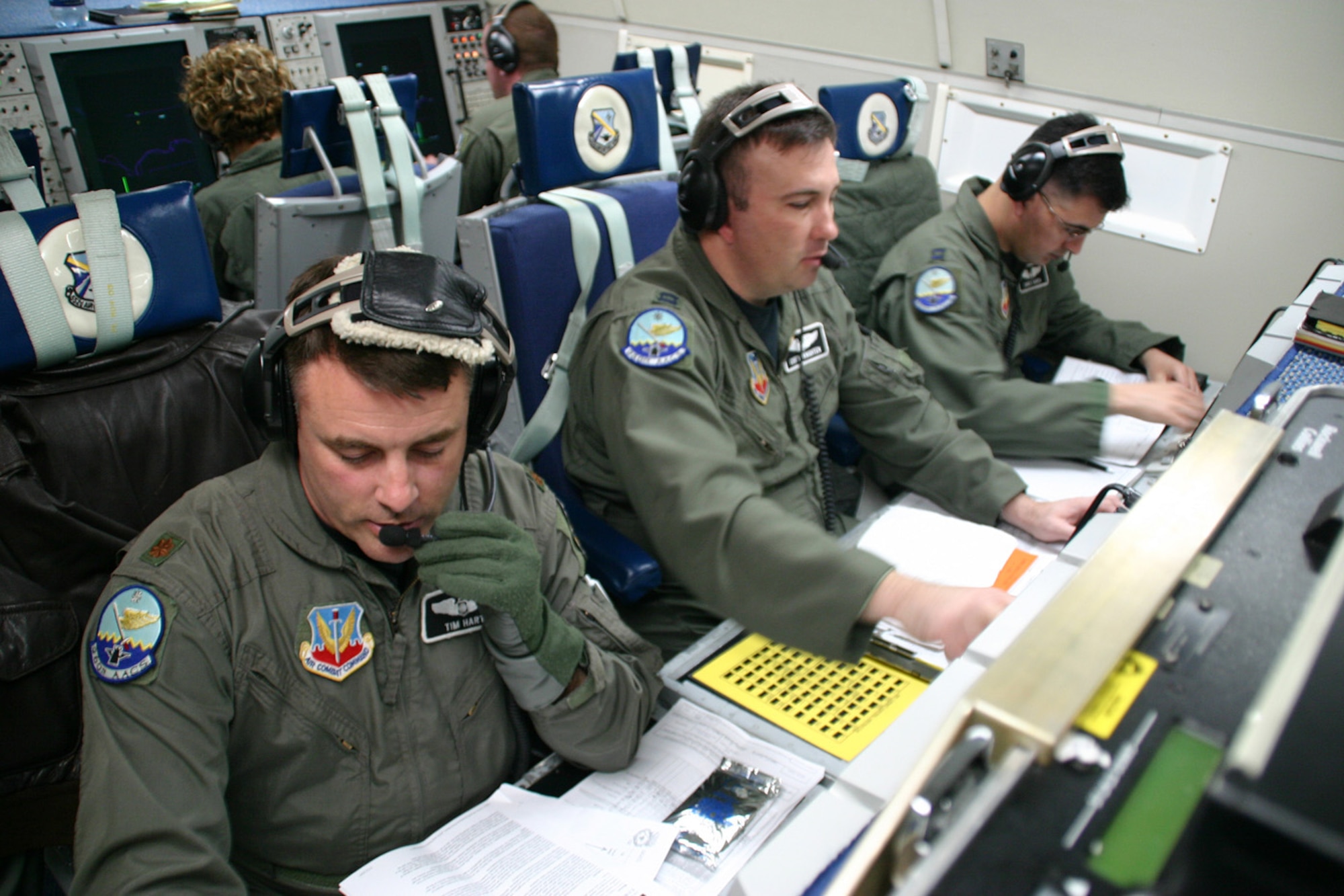Maj. Tim Hart, Capt. Curtis Knighten and Capt. James Garza, 960th Airborne Air Control Squadron, conduct air surveillance and command and control during the E-3 Sentry's 30th anniversary flight Mar. 23.  Airmen have been conduring surveillance missions in the E-3 ever since it first arrived at Tinker Air Force Base, Okla., on Mar. 23, 1977. (Air Force photo/Staff Sgt. Stacy Fowler)