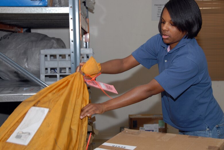 Staff Sgt. Jamie Holt, 379th Expeditionary Communications Squadron, prepares to take mail to the airport downtown. Sergeant Holt has deployed twice to the 379th Air Expeditionary Wing.   (U.S. Air Force by Airman 1st Class Ashley Tyler)