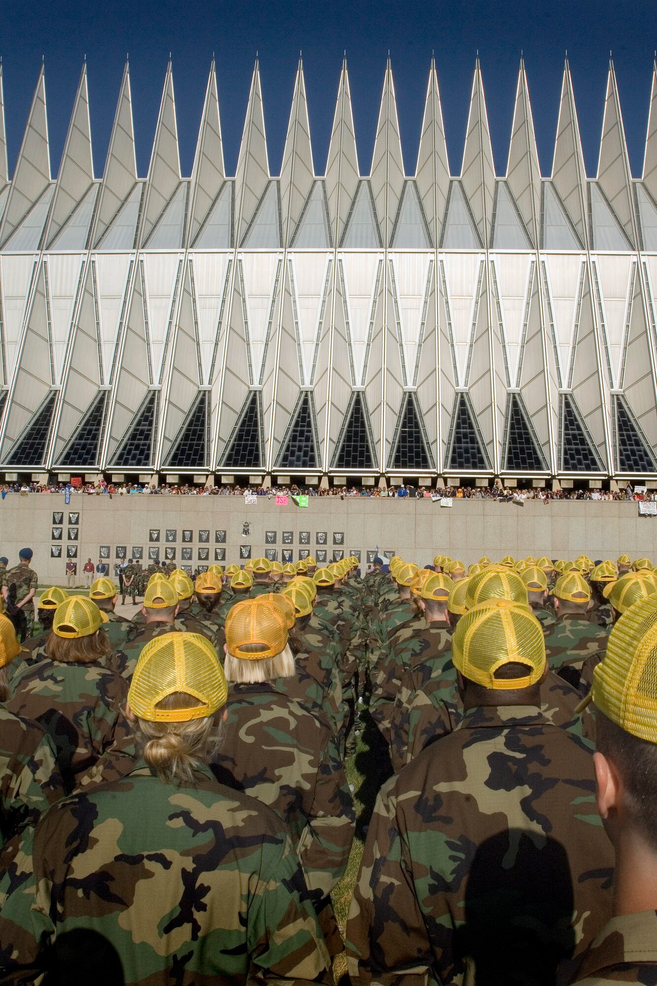 Basic cadets are formed up during the swearing-in ceremony as friends and family cheer on their loved ones June 29 at the U.S. Air Force Academy in Colorado. This ceremony marks the beginning of the first half of basic cadet training, commonly known as "First Beast." (U.S. Air Force photo/Joel Strayer)
