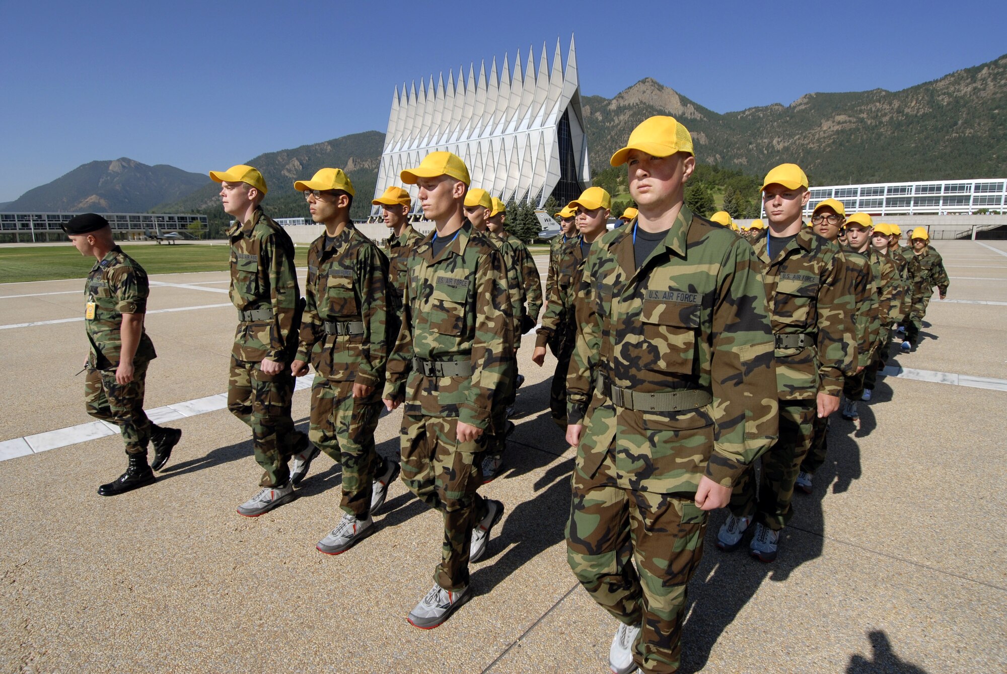 Basic cadet trainees march off the Terrazzo after the swearing-in ceremony June 29 at the U.S. Air Force Academy in Colorado. This ceremony marks the beginning of the first half of basic cadet training, commonly known as "First Beast." (U.S. Air Force photo/Mike Kaplan) 
