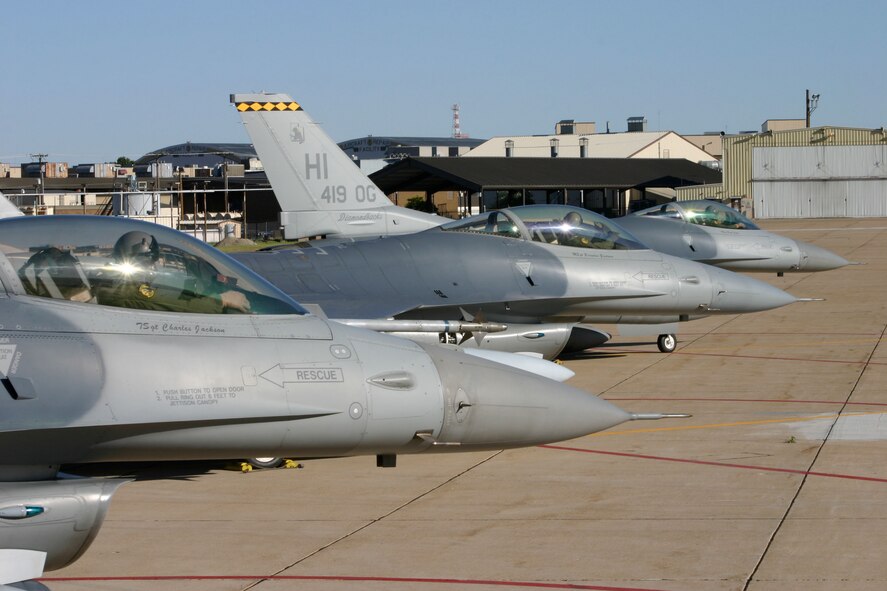 The final three 419th Fighter Wing aircraft prepare to taxi for departure June 28. The aircraft were transferred to Homestead ARB, Fla. The wing's entire fleet of F-16s have been reassigned to other Reserve and Air National Guard bases.  419th pilots and maintainers will now fly and fix F-16s alongside their active duty counterparts in the 388th FW here as part of the Air Force's Total Force Integration initiative.  (U.S. Air Force Photo by Tech. Sgt. Michael Owens)