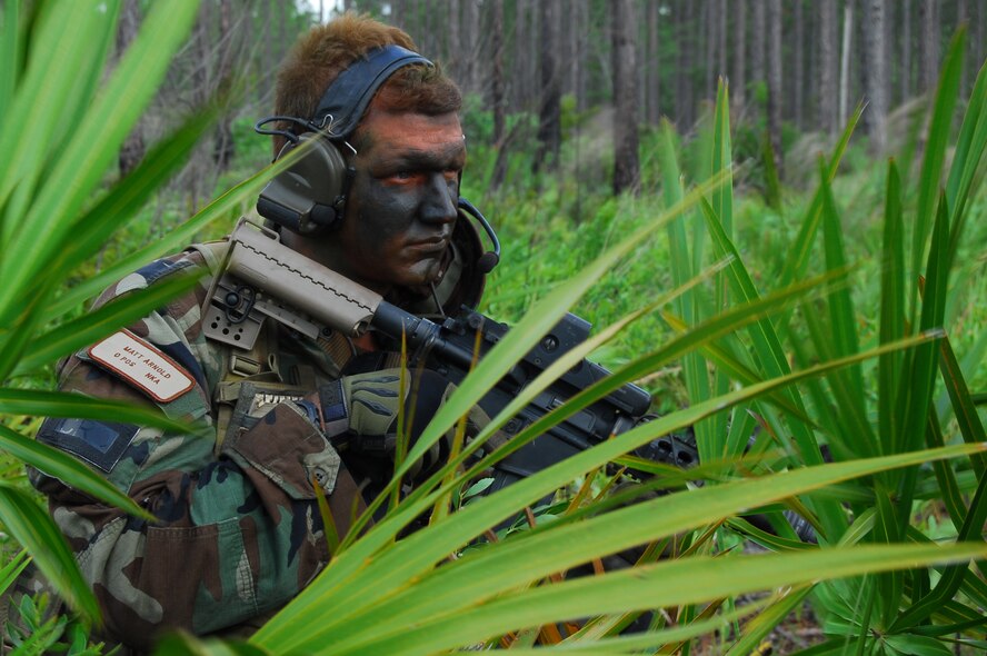 1st Lt. Matthew Arnold, 38th Rescue Squadron combat rescue officer, secures a helicopter landing zone during the filming of a "Do Something Amazing" commercial at Moody Air Force Base June 26-27.  The commercial is intended to highlight Moody's combat rescue role. (U.S. Air Force photo by Tech. Sgt. Parker Gyokeres)