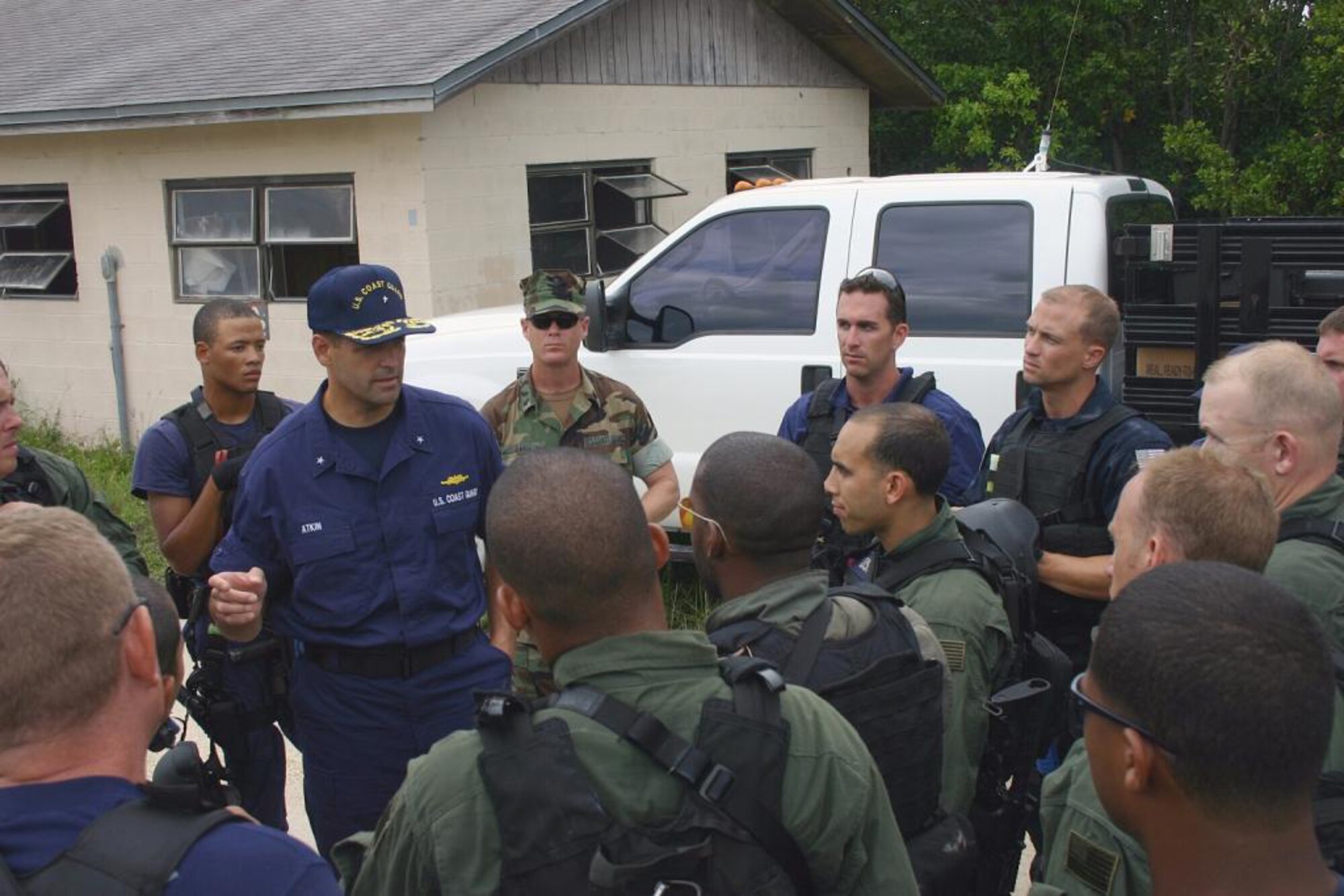 RDML Atkin observed sustainment training hosted by MSST Miami for the Maritime Law Enforcement/Force Protection Teams (MLE/FP) for MSST Miami, MSST New York and Tactical Law Enforcement Team South.  The training combined the first Department of Homeland Security multi-agency effort to conduct joint training. An Immigration and Customs Enforcement Special Response Team fast-roped from a Customs and Border Patrol Black Hawk helicopter to secure a waterside building alongside members of MSST Miami MLE/FP during the training. (U.S. Coast Guard photo/LTJG Kaleb Perez)