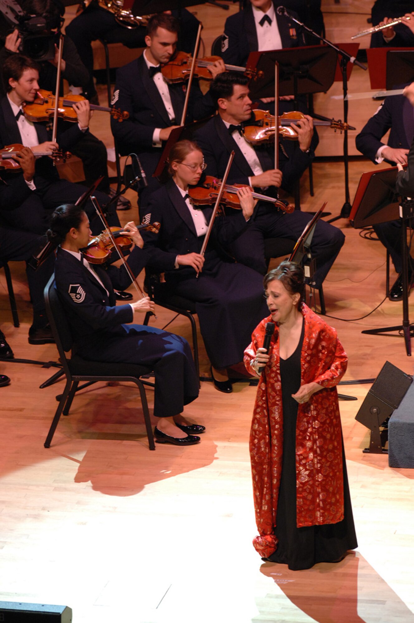 Traditional pop singer Joni James performs with the U.S Air Force Band at Strathmore Music Center in Bethesda, Md., June 30.  Wife of Air Force Gen. Bernard Schriever, Ms. James is a multiplatinum-selling artist who performed with the Band as part of a musical celebration in honor of the U.S. Air Force’s 60th anniversary (U.S. Air Force photo by Airman 1st Class Timothy Chacon)