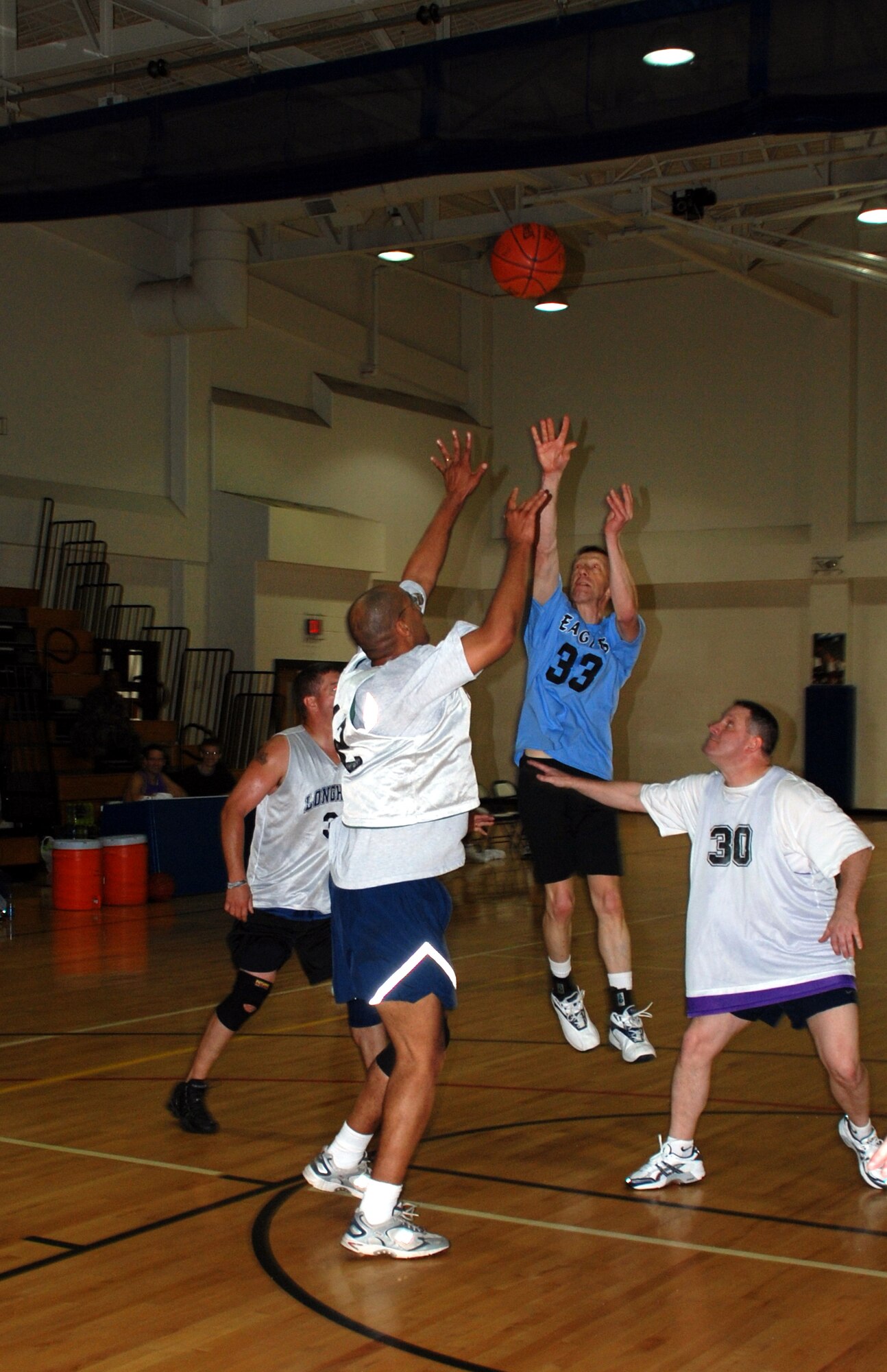 Col. Lansen Conley, 82nd Training Wing vice commander, makes a jump shot during the vice commanders going away basketball tournament June 29 at the Pitsenbarger Fitness Center. Colonel Conley's team, the Eagles, faced off against a team of Sheppard squadron commanders and a team of Sheppard senior NCO's. Coming out strong in the first game, the Eagles beat the squadron commander's team 24-23, but fell to the senior NCO's, 37-26. The Eagles never left the court between games. (U.S. Air Force photo/Airman 1st Class Jacob Corbin)