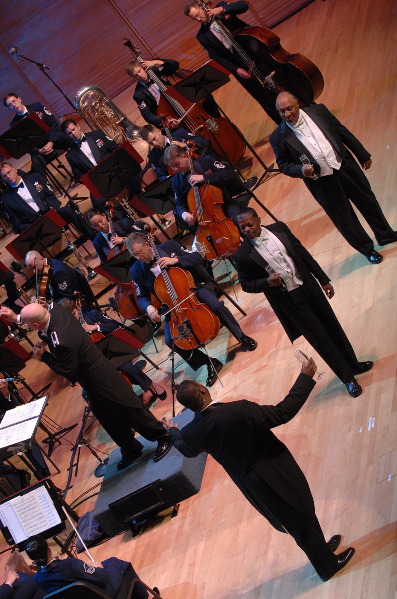 The Tenors Cook, Dixon and Young perform with the U.S. Air Force Band at Strathmore Music center in Bethesda, Md., June 30. The singing ensemble, consisting of Trent Cook, Rodrick Dixon and Thomas Young are a nationally know group that performed with the Band as part of a musical celebration of the U.S. Air Force's 60th anniversary. (U.S. Air Force photo by Airman 1st Class Timothy Chacon)