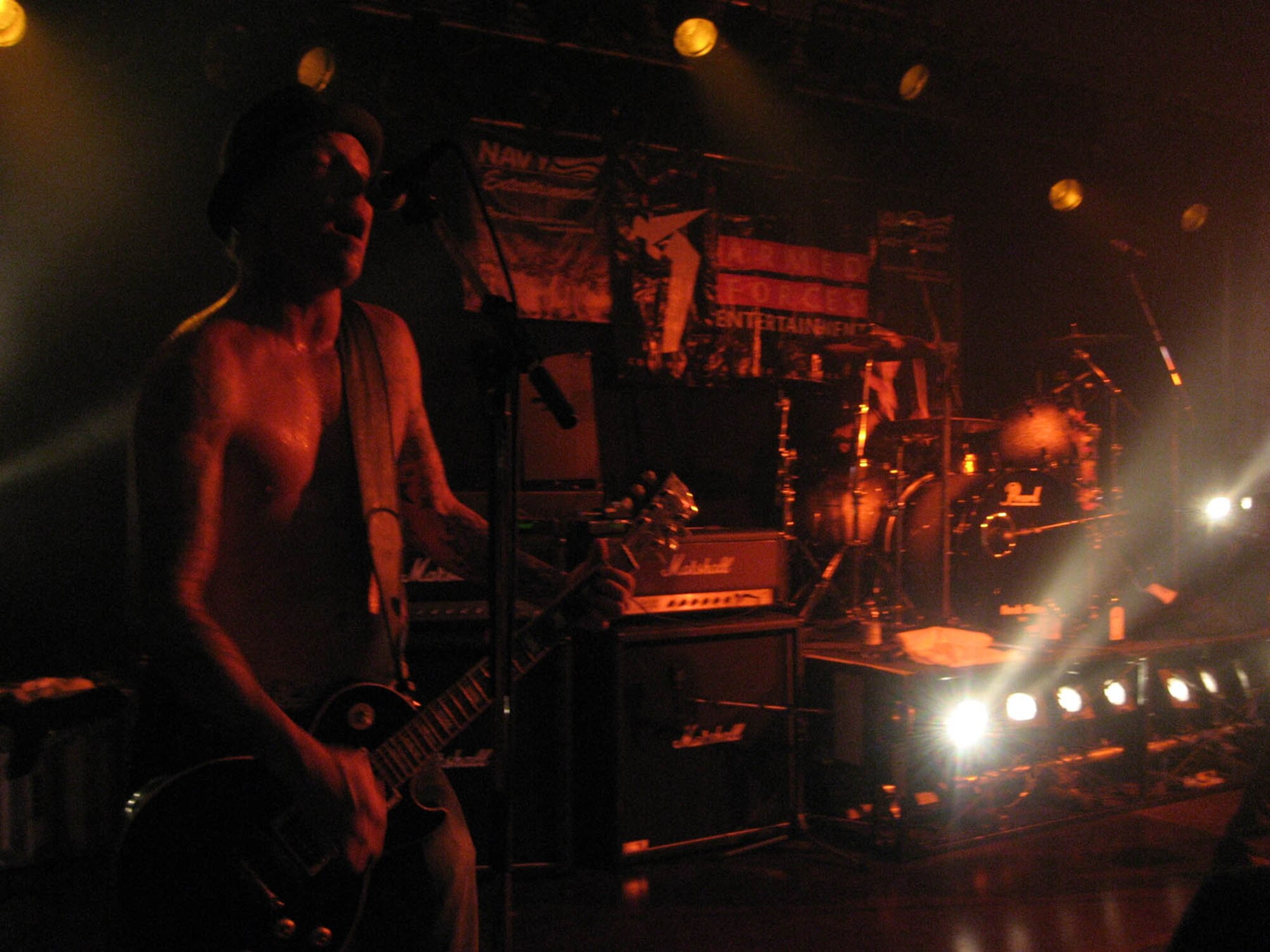 SPANGDAHLEM AIR BASE, Germany – (Left to right) Jeremy Popoff, Lit guitarist, jams at the 50th Annual Bitburg BASH June 30, 2007. All members of Lit an Orange County, California-based band best known for songs like “My Own Worst Enemy” and “Miserable.” (US Air Force photo/Staff Sgt. Andrea Knudson) 