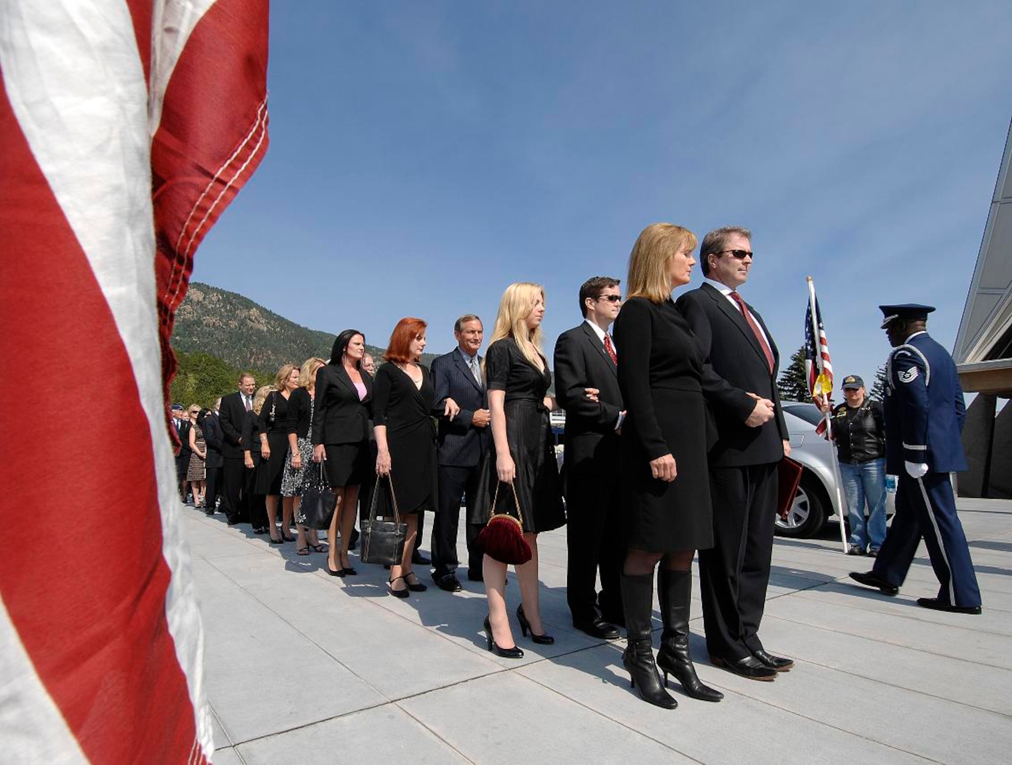 The family of retired Brig. Gen. Robin Olds prepare to enter the U.S. Air Force Academy Cadet Chapel for his memorial service june 30. General Olds, one of the Air Force's leading fighter pilots, died June 14 in Steamboat Springs, Colo. (U.S. Air Force photo/Dennis Rogers)