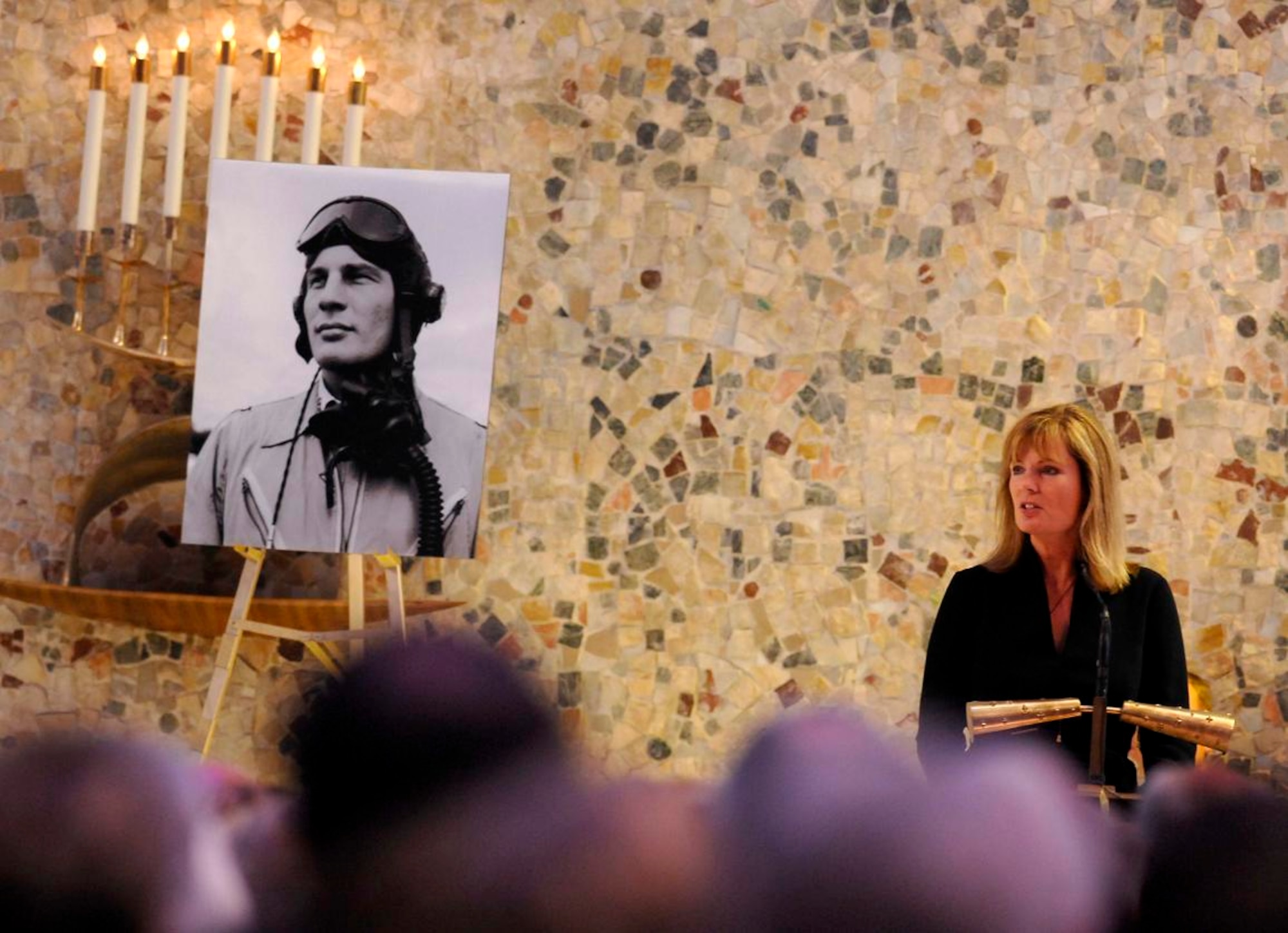 Christina Olds, daughter of legendary fighter pilot, retired Brig. Gen. Robin Olds, addresses well wishers during his memorial service at the U.S. Air Force Academy Cadet Chapel June 30.  General Olds died June 14 in Steamboat Springs, Colo.  (U.S. Air Force photo/Dennis Rogers)