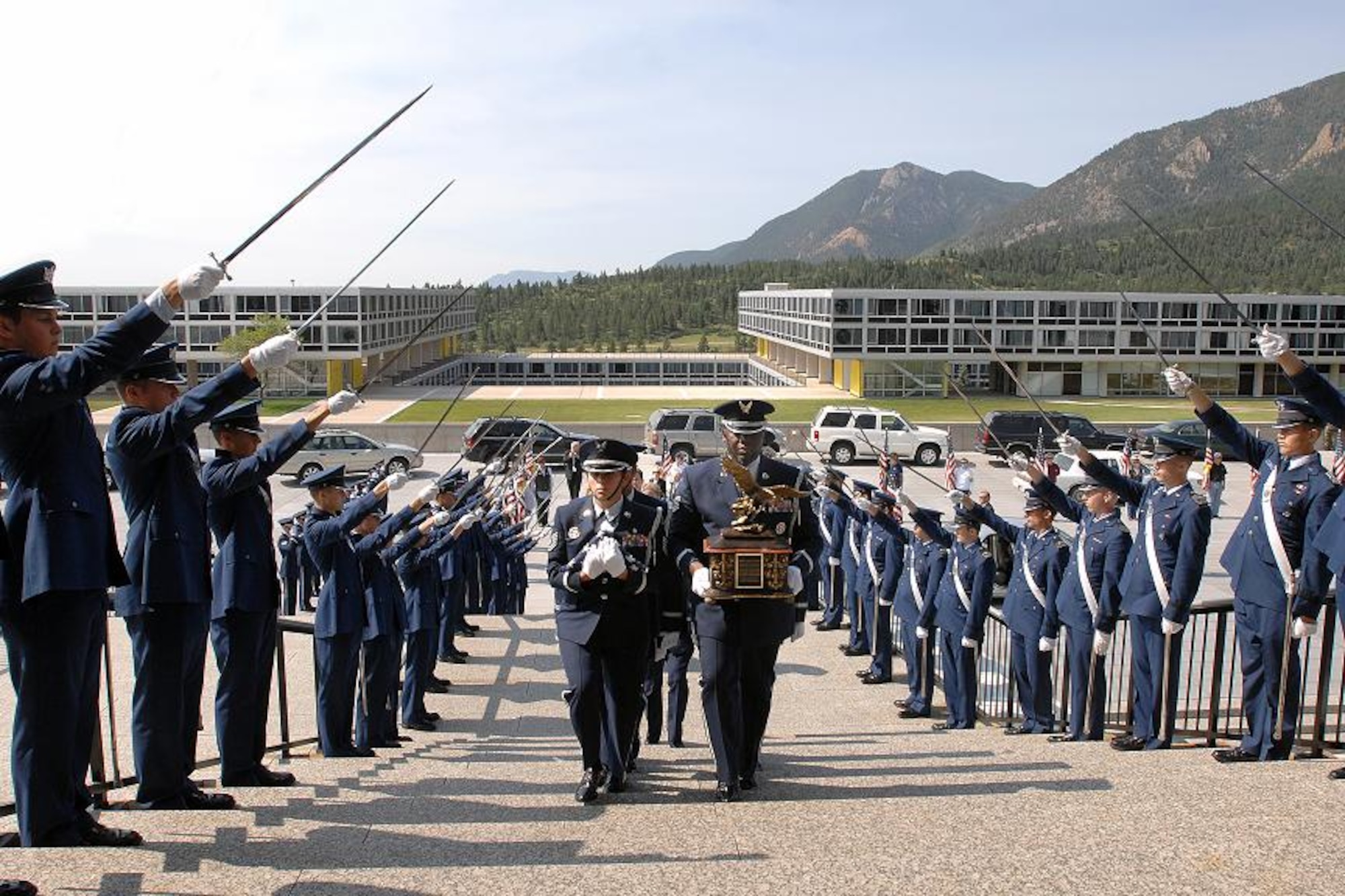 The urn containing the ashes of Brigadier General Robin Olds are carried through a saber cordon by the U.S. Air Force Academy Honor Guard into the Cadet Chapel Saturday.  General Olds, one of the Air Force's leading fighter pilots, died June 14th in Steamboat Springs, Colorado.   (U.S. Air Force photo/Danny Meyer)