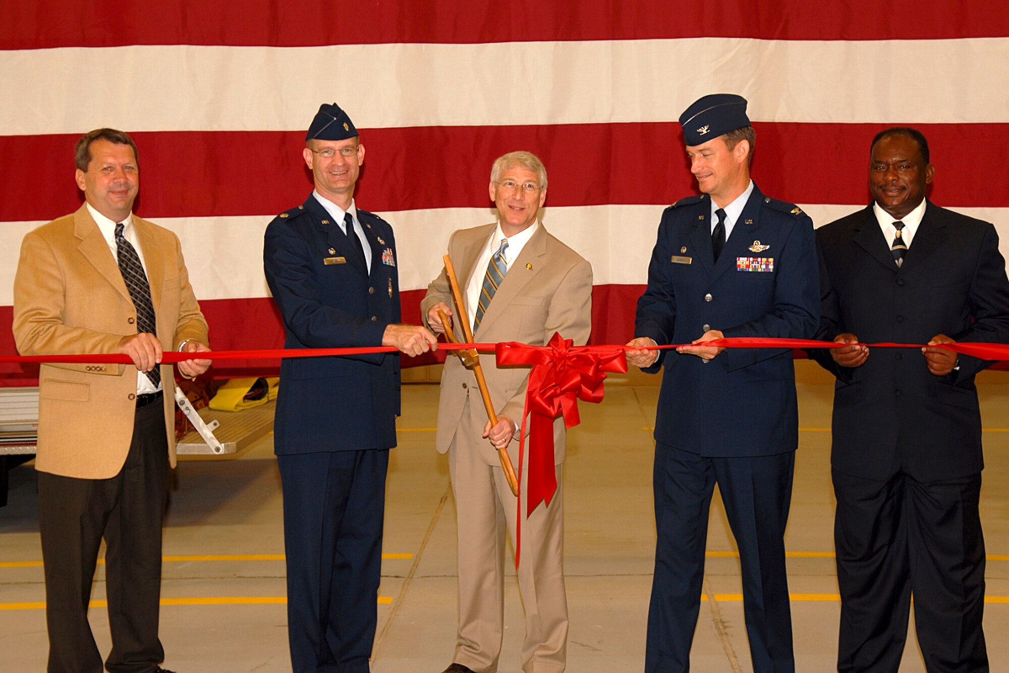 Mississippi Congressman Roger Wicker cuts the ribbon at the new Crash Fire and Rescue station Tuesday. He is accompanied by Steve Arendale, U.S. Army Corp of Engineers, Lt. Col. Robert Germann, 14th Civil Engineer Squadron commander, Col. Dave Gerber, 14th Flying Training Wing commander, and the Honorable Robert Smith, Mayor of the City of Columbus. (U.S. Air Force Photo by Tammy Baudoin)