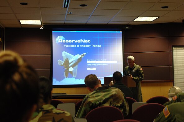 Maj. John Wood briefs members of the 931st Air Refueling Group on the benefits and simplicity of ReserveNet.