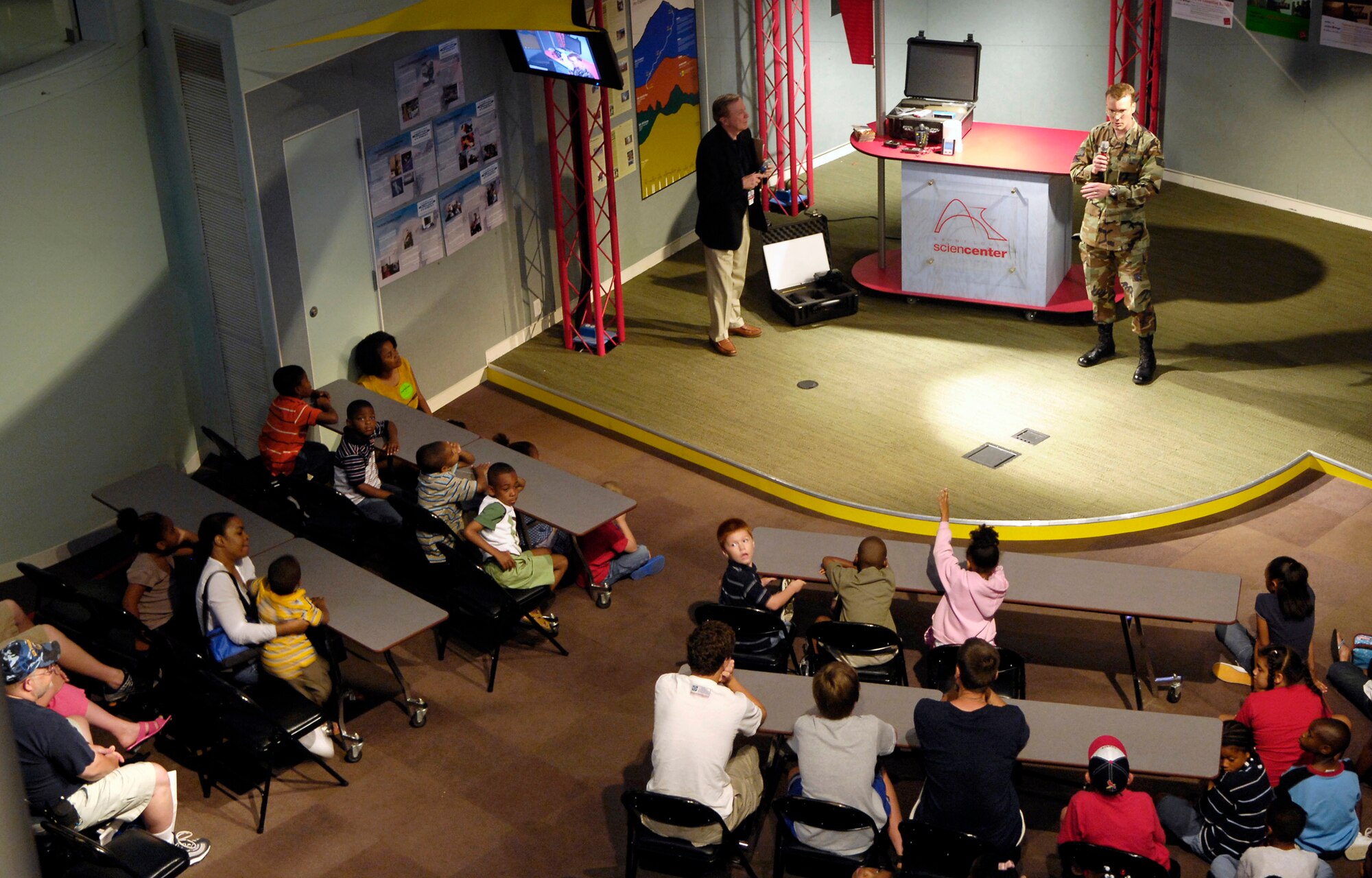Staff Sgt. Troy Goercke provides a presentation about combat weather to parents and children July 2 at the Saint Louis Science Center. Combat weather technicians were on hand at the center for the kickoff of Air Force Week being celebrated in St. Louis, this week. Sergeant Goercke is assigned to Det. 5 of the 10th Combat Weather at Fort Bragg, N.C. (U.S. Air Force photo/Staff Sgt. Brian Ferguson) 