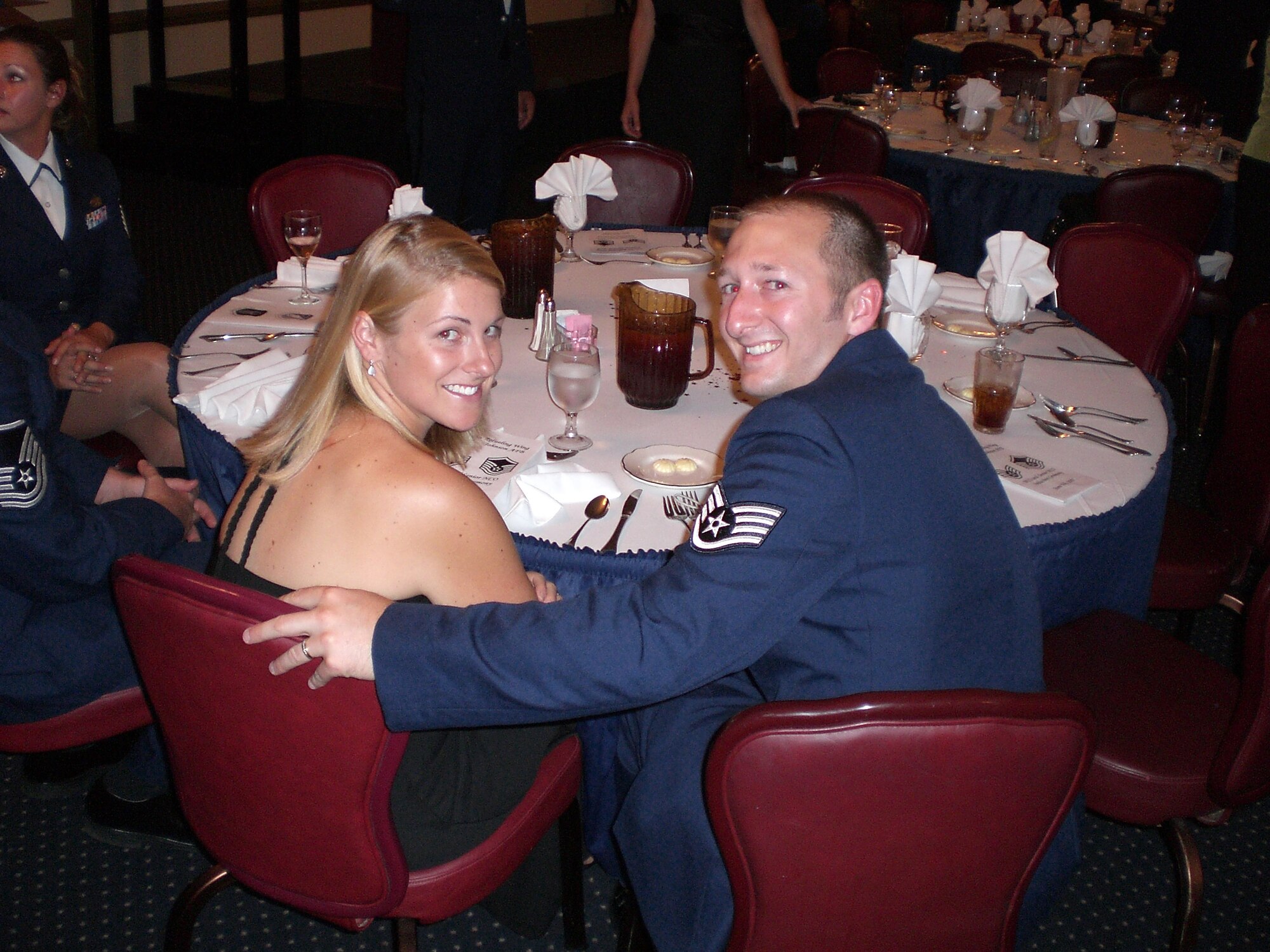 SEYMOUR JOHNSON AIR FORCE BASE-- Newly promoted Staff Sgt. Lee Farlow takes a moment to smile for the camera during the 2007 NCO Induction Ceremony at Seymour Johnson Air Force Base. Sgt. Farlow was one of more than two dozen non-commissioned officers recognized during the annual banquet. Nearly 300 members of the 916th Air Refueling Wing, Air Force Reserve, and guests attended to evening's activities in June. Sgt. Farlow, a member of the 916th Communications Squadron, attended with his wife.