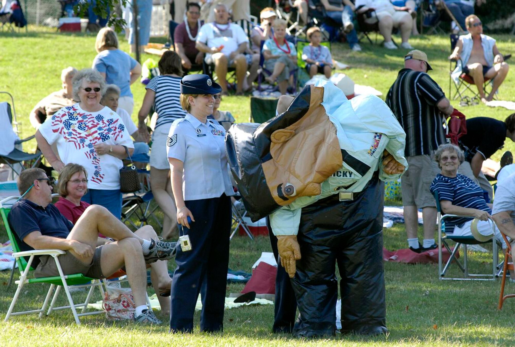 Tech Sgt. Tracy Bennett and spectators at the Jefferson Barrack Blast look on as Ricky the Recruiter deflates due to a temporary zipper malfunction.  St. Louis County, in partnership with the Air Force during Air Force Week, put on the blast, entertaining the more than 20,000 in attendance. Ricky was re-inflated and continued his walk around the park, visiting with most everyone. 
(U.S. Air Force photo/Staff Sgt. Brian Ferguson)
