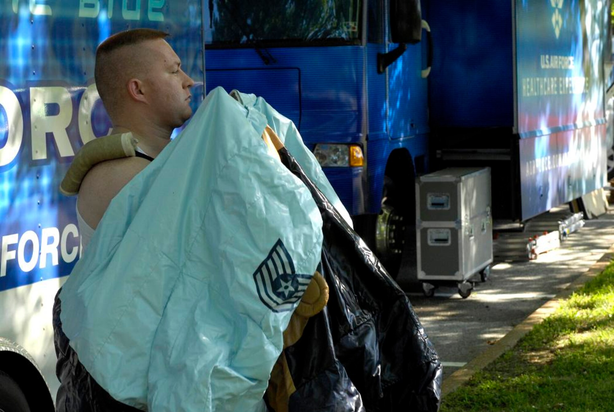 Staff Sgt. Mike Brown puts on the Ricky Recruiter suit which will inflate into a giant Air Force Tech Sergeant.  Sgt. Brown dawned the suit during the Jefferson Barracks Blast, July 3, 2007.  St. Louis County, in partnership with the Air Force during Air Force Week, put on the blast, entertaining the more than 20,000 in attendance. Sgt. Brown is a recruiter with the 345th Recruiting Squadron, Scott Air Force Base, IL.
(U.S. Air Force photo/Staff Sgt. Brian Ferguson)
