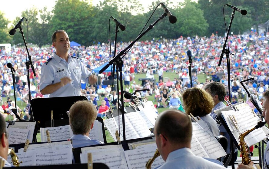 Commander and Conductor, Maj. Don Schofield, leads the U.S. Air Force Band of Mid-America as the perform at the Jefferson Barracks Blast, July 3, 2007.  St. Louis County, in partnership with the Air Force during Air Force Week, put on the blast, entertaining the more than 20,000 in attendance. 
(U.S. Air Force photo/Staff Sgt. Brian Ferguson)