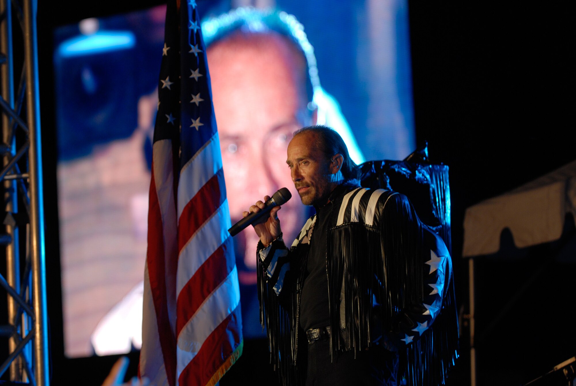 Lee Greenwood performs to a packed house July 3 during the Air Force Reserve Command's annual Independence Day Concert in Warner Robins, Ga. The concert, which also features the Band of the Air Force Reserve, is being broadcast worldwide over the American Forces Network beginning July 4. (Courtesy photo/Ken Hackman)