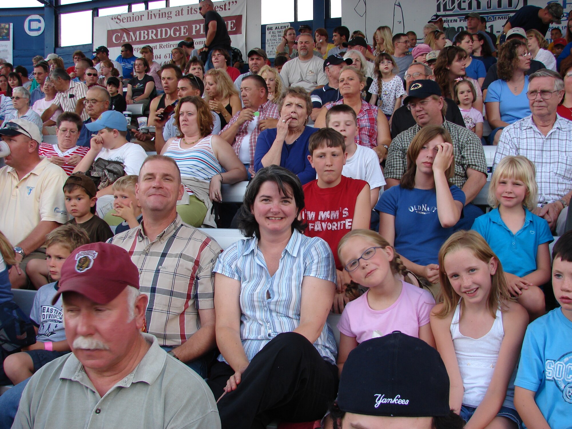 Col. Kris Beasley, former 341st Mission Support Group commander, and his family smile for the camera one last time before their departure from Malmstrom. They were enjoying the Military Appreciation Night at Centene Stadium June 29. (U.S. Air Force photo / JoAnn Gogo)