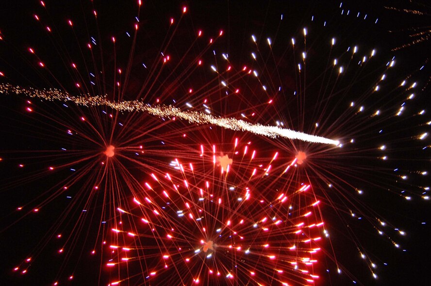 MINOT AIR FORCE BASE, N.D. -- The sky over Minot Air Force Base was well lit while people watched the fireworks display at Bud Ebert Park July 4. The base held various activities for base members throughout Independence Day, such as a free swim day at the outdoor pool and a picnic with free hotdogs and hamburgers. (U.S. Air Force photo by Senior Airman Stacy Moless)