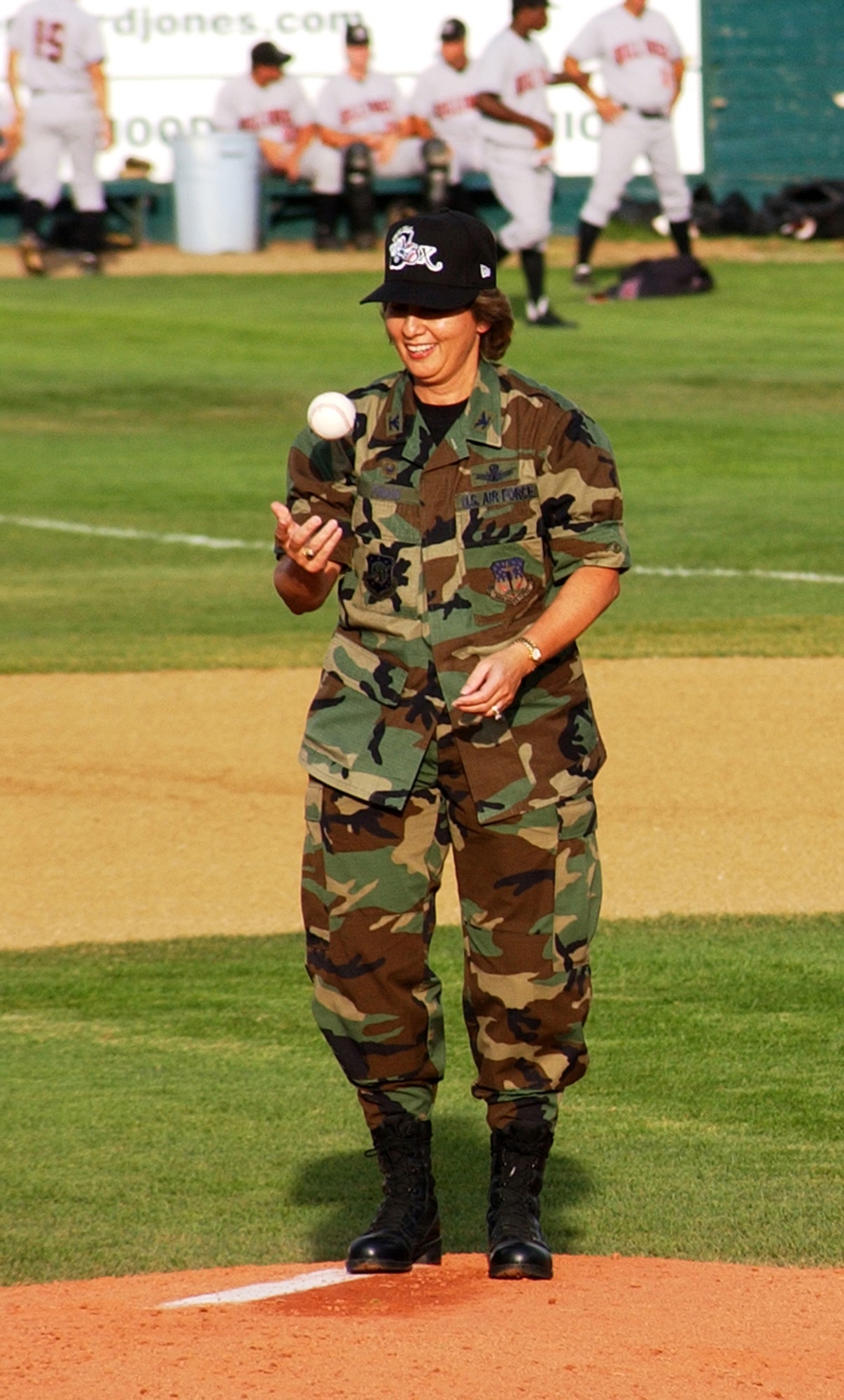 Col. Sandy Finan, 341st Space Wing commander, prepares to throw out the first pitch to begin festivities at Military Night at the Great Falls White Sox. (U.S. Air Force photo/ Airman 1st Class Dillon White)
