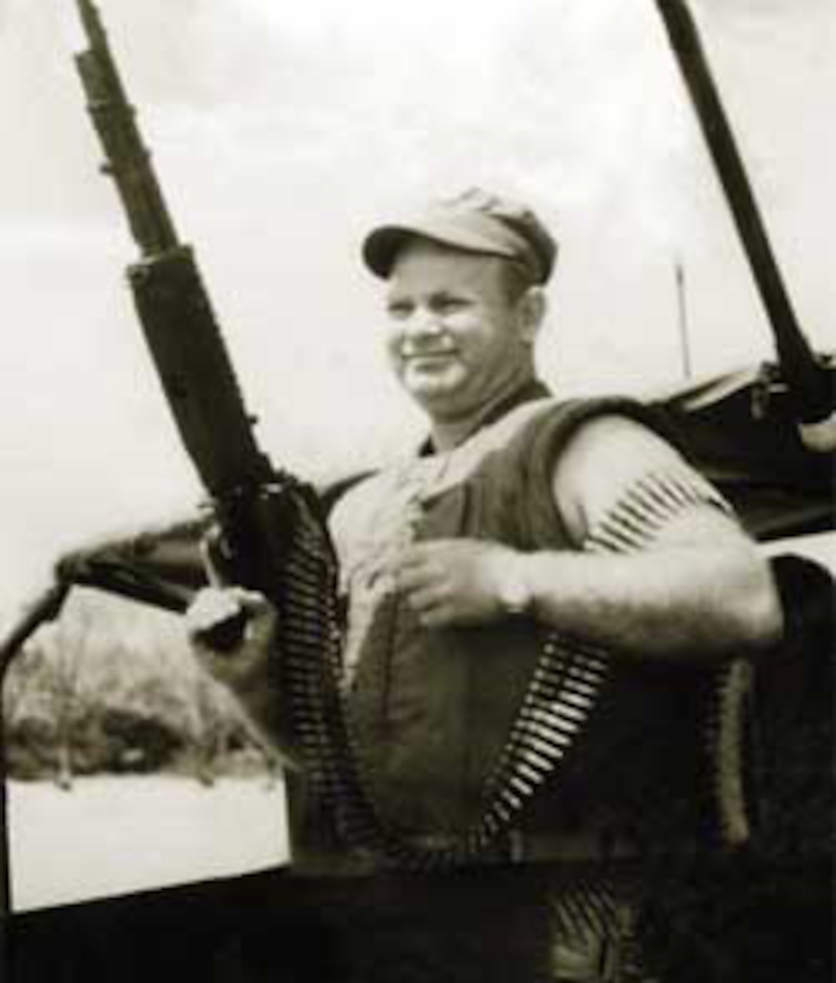 Boatswain's Mate First Class James Williams stands aboard River Patrol Boat 105 in Vietnam. (Courtesy photo)