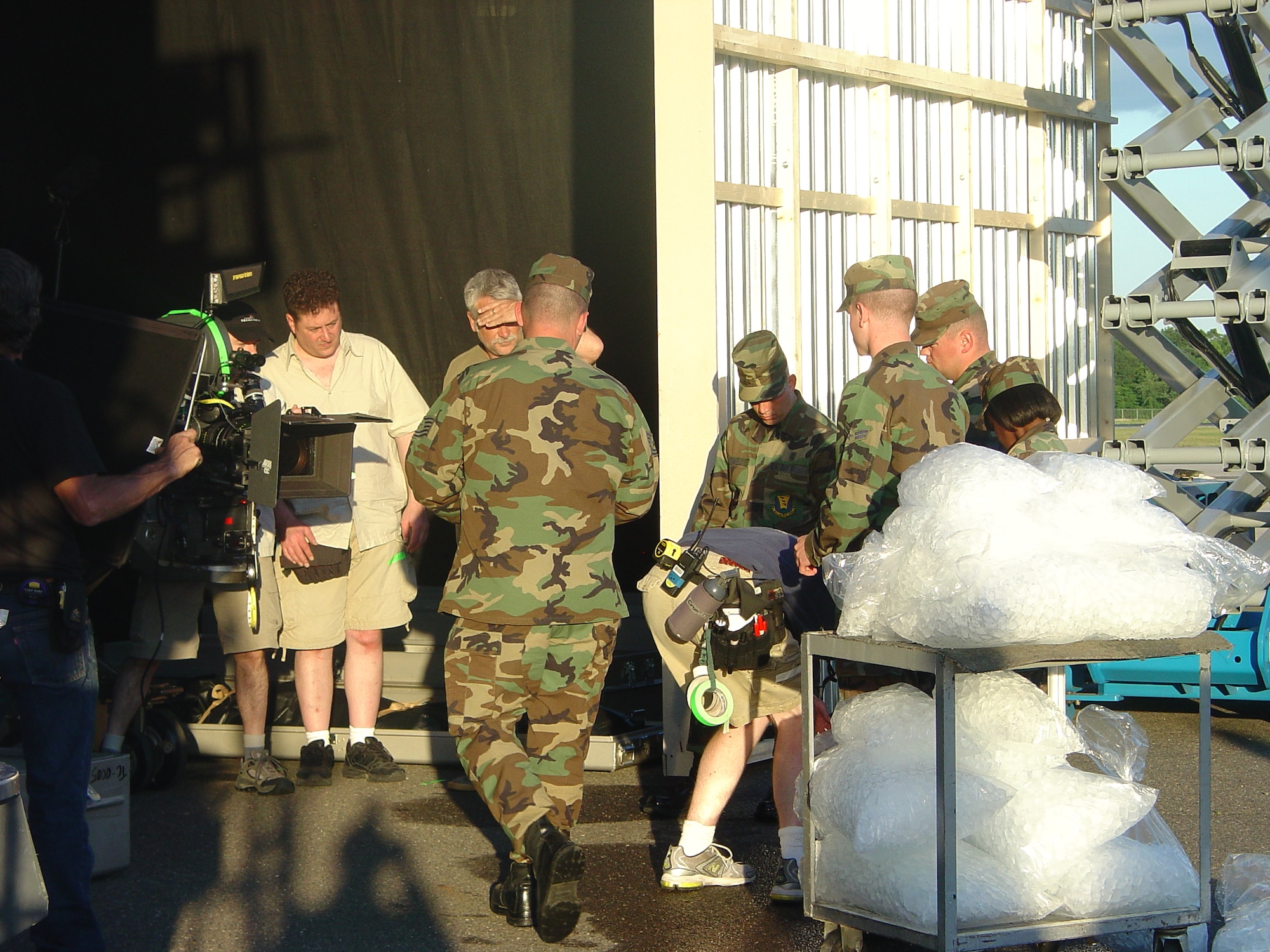 HBO Films sets-up for a scene, which includes "extras" from McGuire Air Force Base. The film portrays the experiences and encounters of Marine Lt. Col. Mike Strobl while accompanying Marine Pfc. Chance Phelps to his final destination.