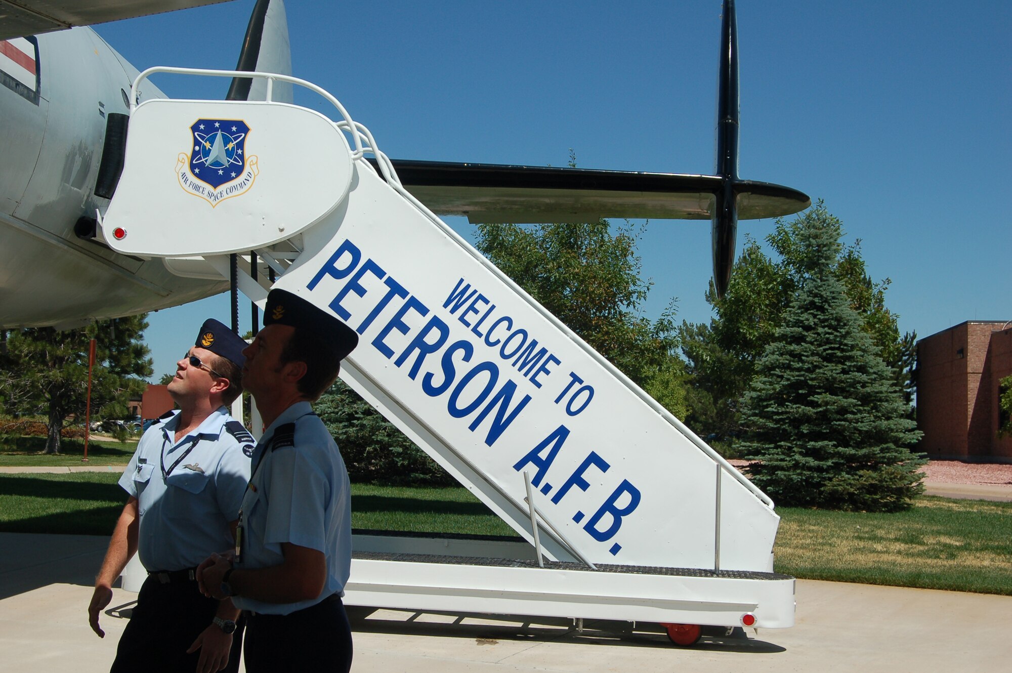 Visiting members of Australia’s National Guard check out exhibits at the Peterson Museum in June. Peterson attracts a few thousand tourists and visitors each year, thanks to its museum and affordable lodging program. (U.S. Air Force photo by Corey Dahl)