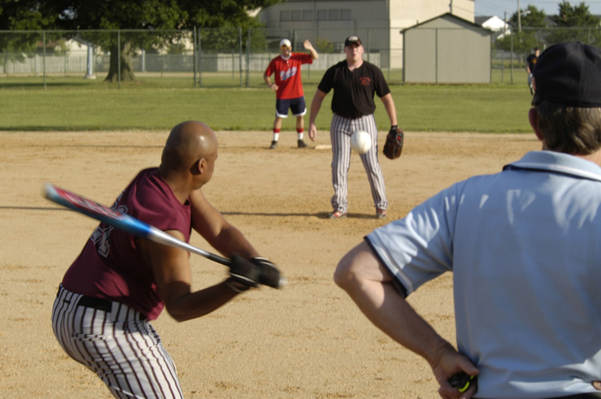 Kelvin Carter, 436th Logistics Readiness Squadron first baseman, swings for a pitch in Monday’s intramural softball game against the 436th Aerial Port Squadron. The Loggies defeated the Porters 24 – 12 over six innings of play. (U.S. Air Force photo/Senior Airman James Bolinger)
