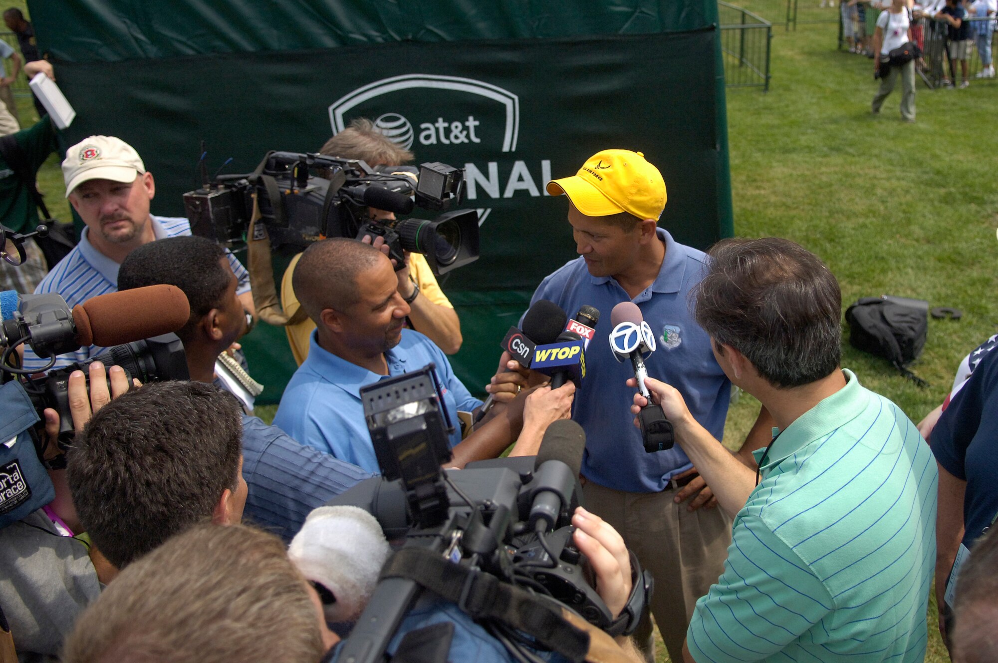 Tech. Sgt Andy Amor, 316th Civil Engineer Squadron, gives an interview with local and national media after playing in a Pro-Am with Tiger Woods.  Sergeant Amor was selected to represent the Air Force at the Pro-Am event before the start of the AT&T National Golf Tournament at Congressional Country Club in Bethesda, Md., July 4. Tiger Woods is the event host as well as a contestant and spokes person. (U.S. Air Force photo by Senior Airman Dan DeCook)
