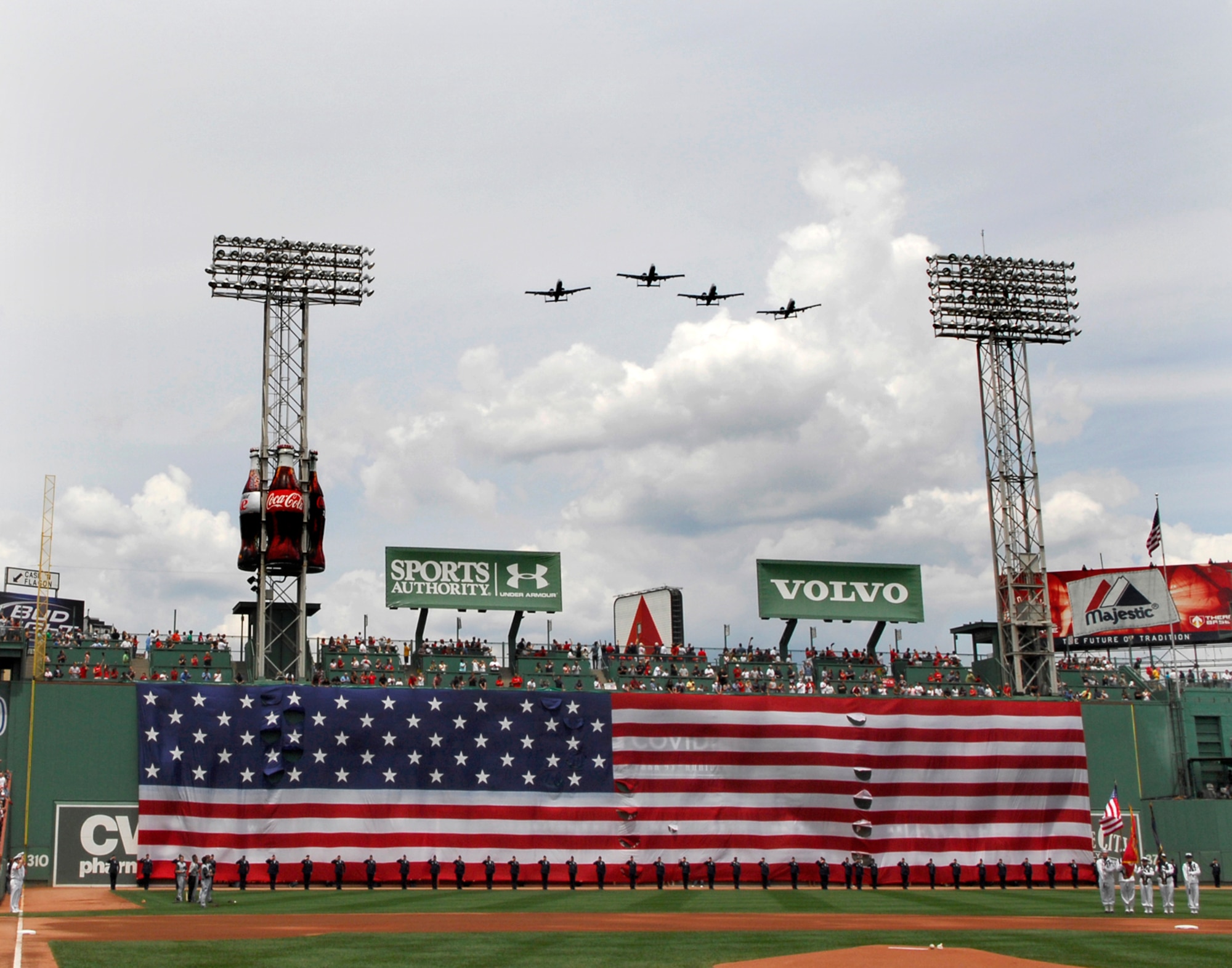 Hanscom AFB -- A formation of A-10s from Barnes Air National Guard Base, Westfield, Mass., takes flight during a flyover at the Boston Red Sox game at Fenway Park July 4 against the Tampa Bay Devil Rays. The Red Sox claimed victory over the Devil Rays with a 7-5 win. (U.S. Air Force photo by Mark Wyatt)