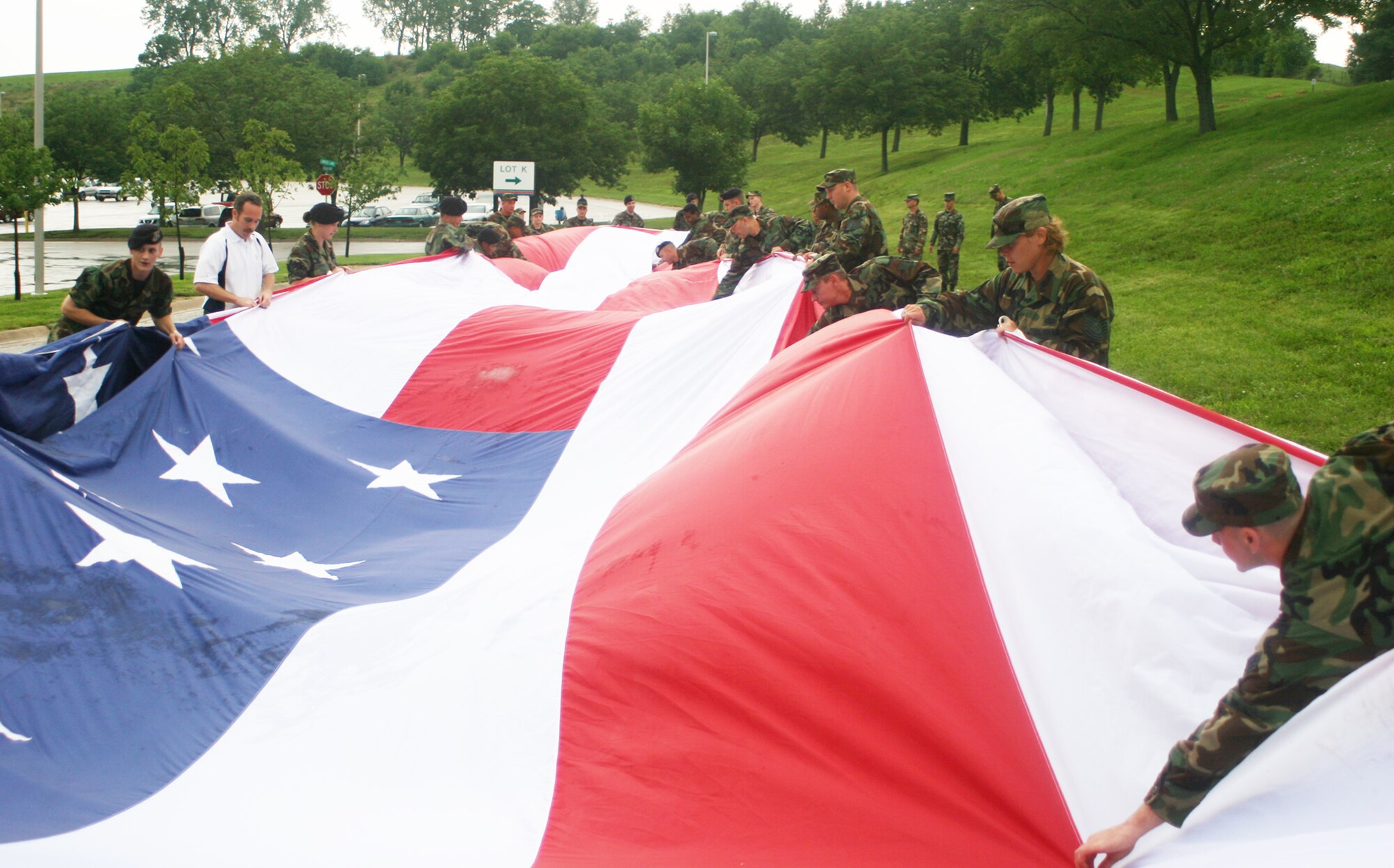 KANSAS CITY, Mo. - Whiteman Airmen make sure the flag is ready to unfurl before the Kansas City Royals take on the Seattle Mariners July 4 at Kaufmann Stadium. (U.S. Air Force photo/Tech. Sgt. Matt Summers)