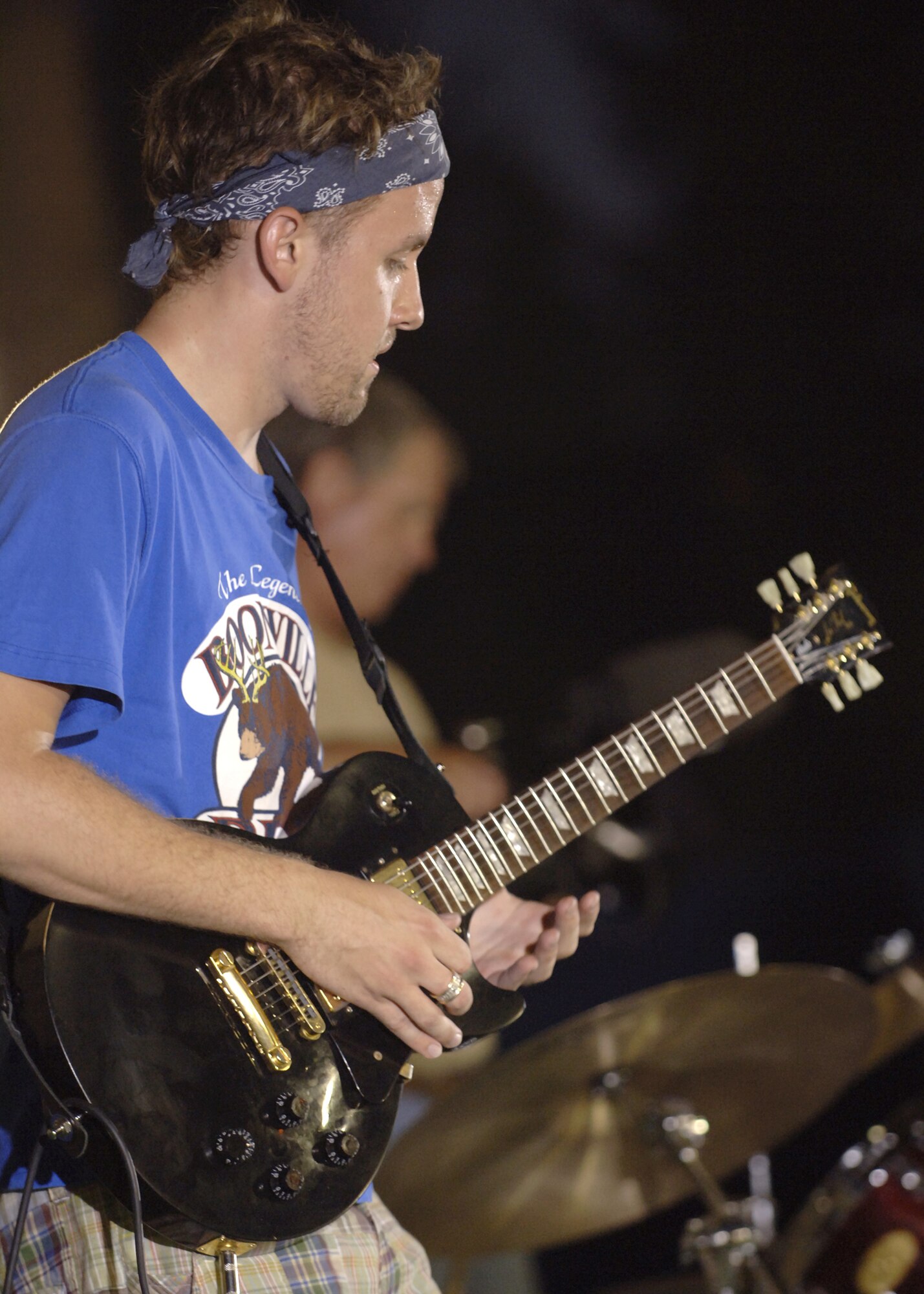 Patrick McGarey, guitarist for the band Sole Funktion, performs during the 4th of July celebration at Arkadas Park.  The festivities included fireworks, food and music by the Armed Forces Entertainment band Sole Funktion. (U. S. Air Force photo by Airman 1st Class Nathan W. Lipscomb)