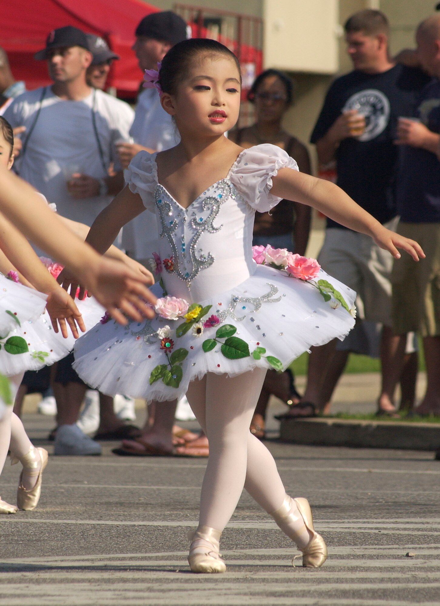 KUNSAN AIR BASE, Republic of Korea -- Korean dancers perform here during Fourth of July celebrations. The base celebrated the U.S.'s 231st birthday. Festivities included a watermelon-eating contest, float parade and fireworks show. (U.S. Air Force photo/Staff Sgt. Darcie Ibidapo)
