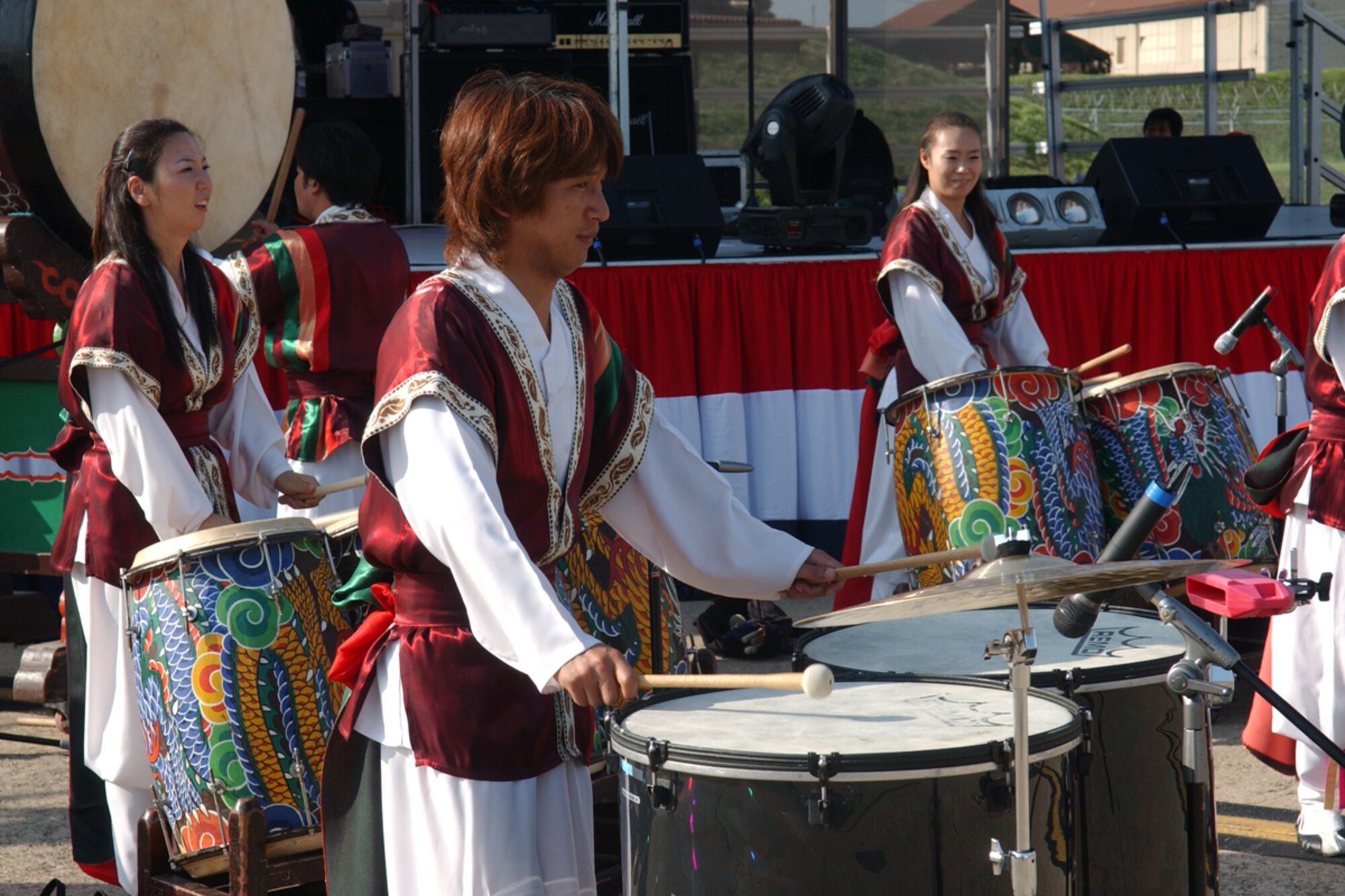 OSAN AIR BASE, Republic of Korea -- Korean NANTA drum performers entertain a crowd during the July 4th celebration Liberty Fest.  Liberty Fest provided members of Team Osan with food, drink, and entertainment to celebrate the holiday, culminating with the firework display later in the night.  (U.S. Air Force photo by Staff Sgt. Christopher A. Marasky)