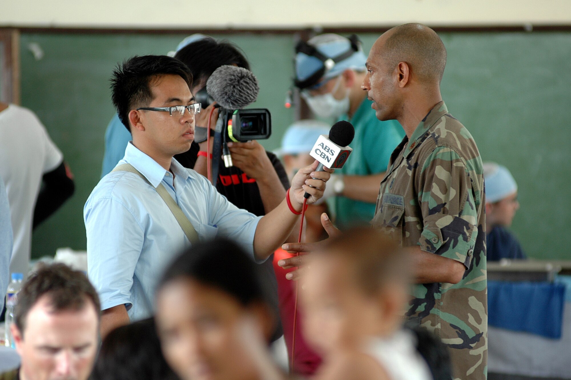 LEGASPI, Philippines (July 6, 2007)– U.S. Air Force Maj. Bernard Van Pelt is interviewed by a local Philippine television station about the medical and dental work for the local residents at Gogon Elementary School. Van Pelt led a medical group who provided medical services at the school in support of Pacific Partnership. The four-month Pacific Partnership humanitarian-assistance mission brings to the region general and ophthalmology surgery, basic medical evaluation and treatment, preventive medicine treatment, dental screenings and treatment, optometry screenings, eyewear distribution, public health training and veterinary services as requested by the Philippine government. U.S. Navy photo by Mass Communication Specialist 2nd Class (SW/AW) Kerryl Cacho 
