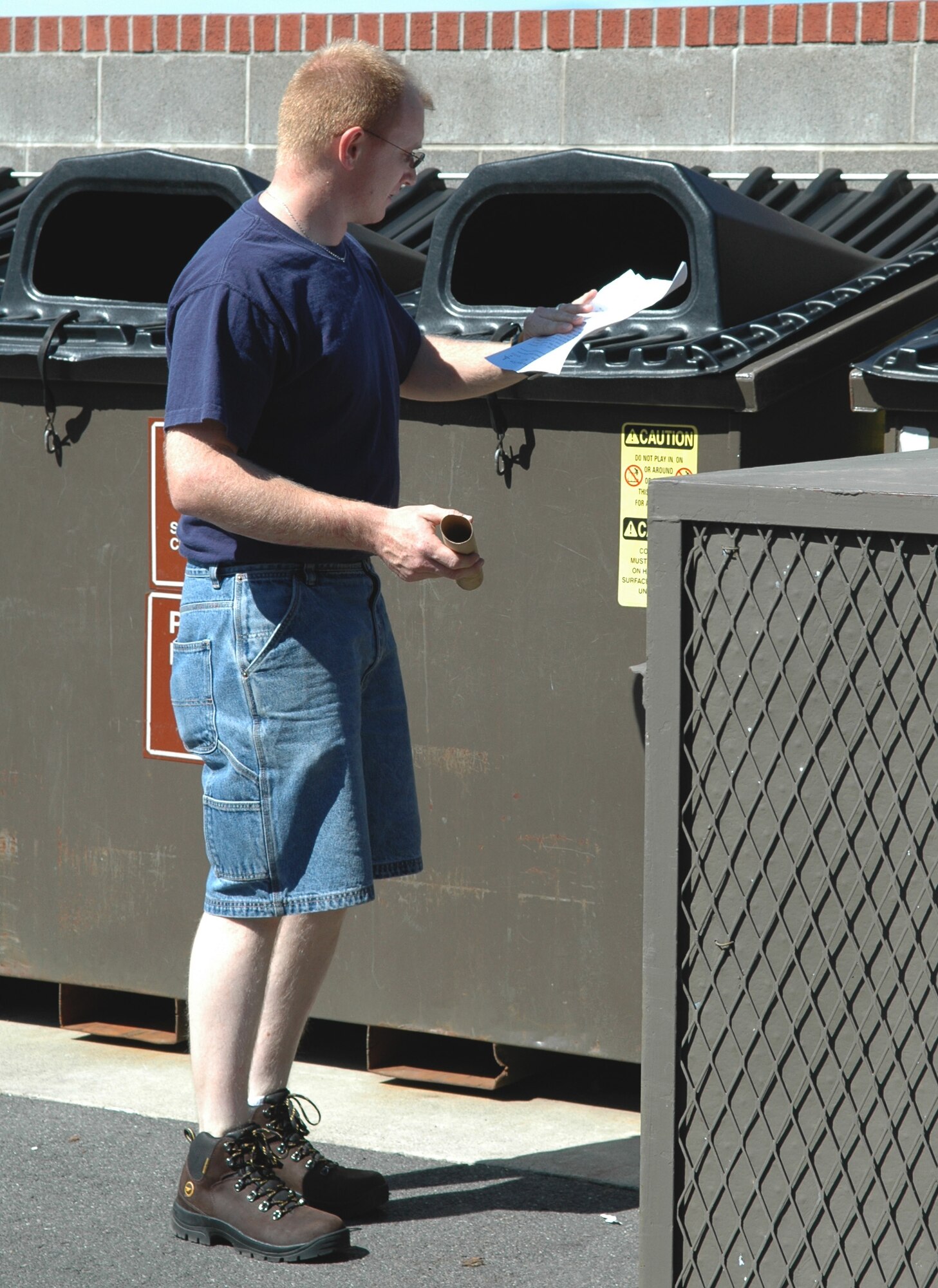 FAIRCHILD AIR FORCE BASE, Wash. – A local man recycles his items at the base Recycling Center, a facility recognized for its excellent services. Available to anyone able to access the base, the crates outside of the center provide a space for various recyclable materials. (U.S. Air Force photo/Airman 1st Class Kali L. Gradishar)