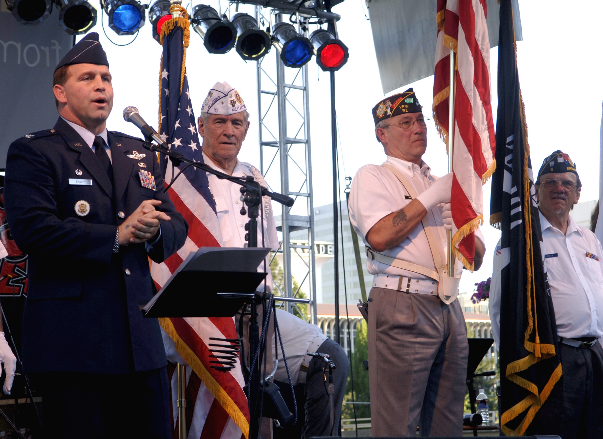 FAIRCHILD AIR FORCE BASE, Wash. – Col. Thomas Sharpy, 92nd Air Refueling Wing commander, speaks at the July 4 Neighbor Day veterans’ presentation at Spokane’s Riverfront Park. More than 40,000 people attended the Independence Day event. Air Force participation also included a national anthem vocalist, a KC-135 Stratotanker flyover and booth volunteers.  (U.S. Air Force photo/ Senior Airman Chad Watkins)