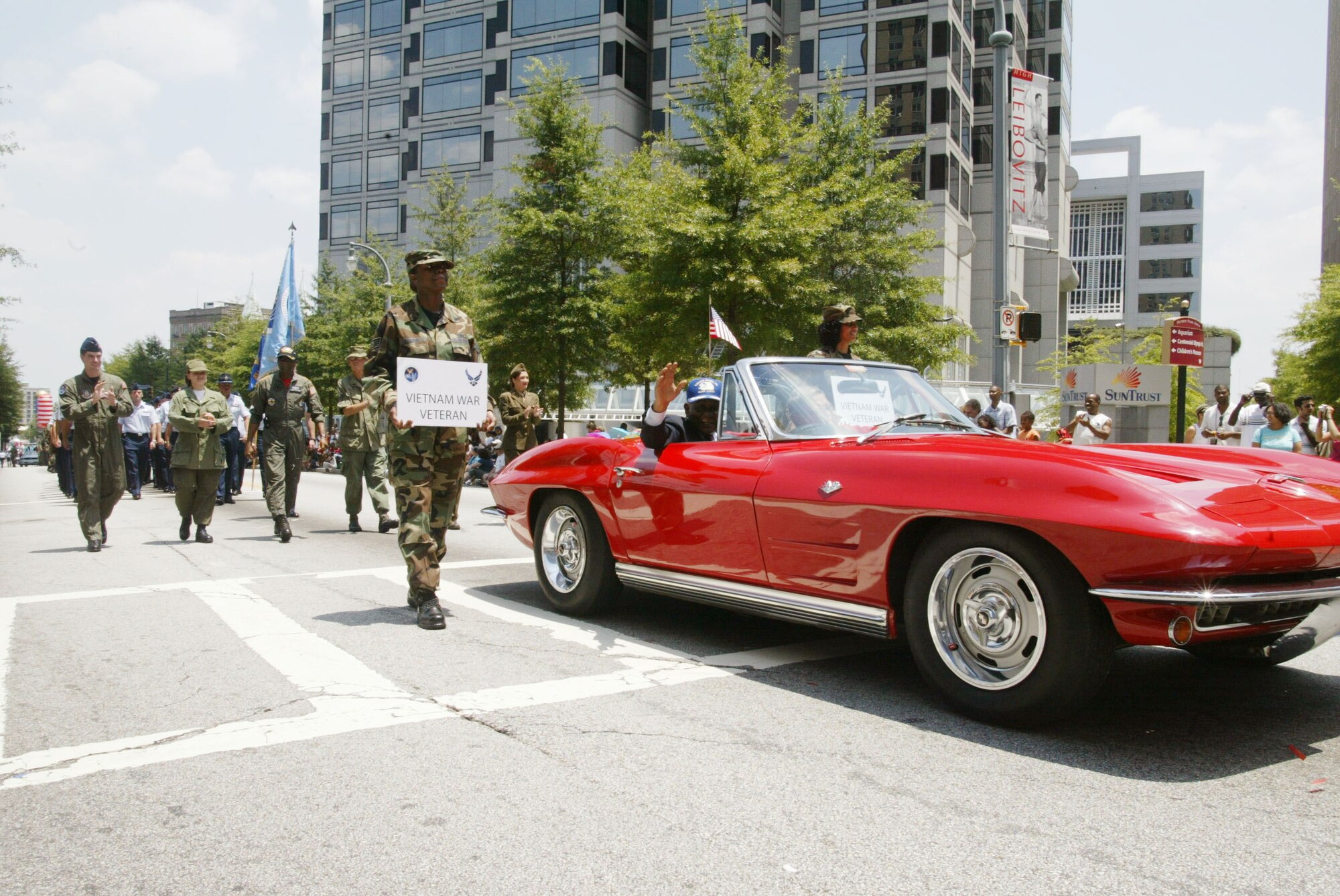 Chief Master Sgt. Kay Mack, riding in a 1964 Chevrolet Corvette and in his original uniform, represents the Vietnam Veterans of Georgia at the "Salute to America" parade in downtown Atlanta on the 4th of July.(U.S. Air Force photo/Don Peek)